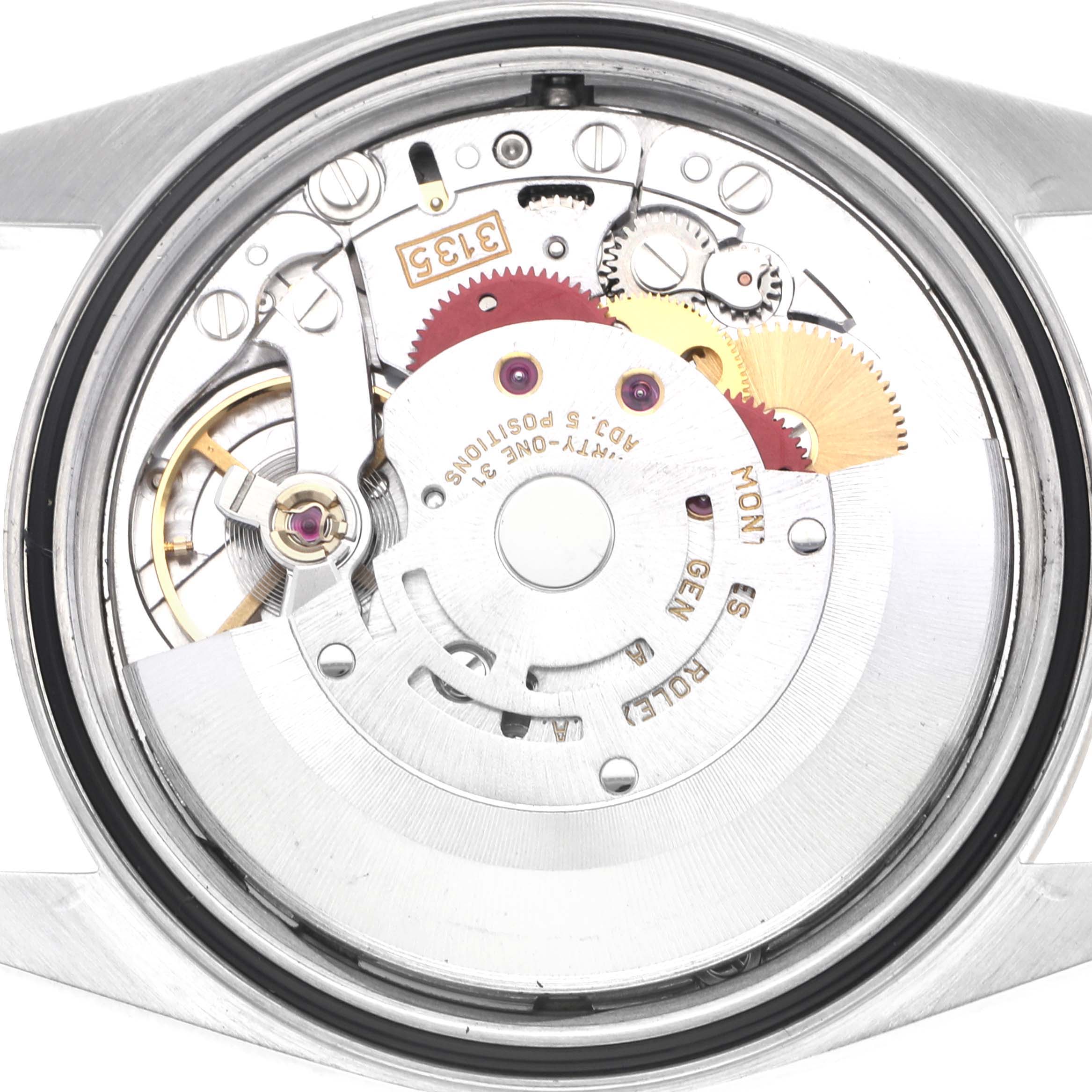 The image shows the internal mechanism of a Rolex Datejust 16233 Men's Steel and Gold (two tone) Champagne Dial 16233 Men's Steel and Gold (two tone) Champagne Dial watch from a back view, highlighting gears and components.