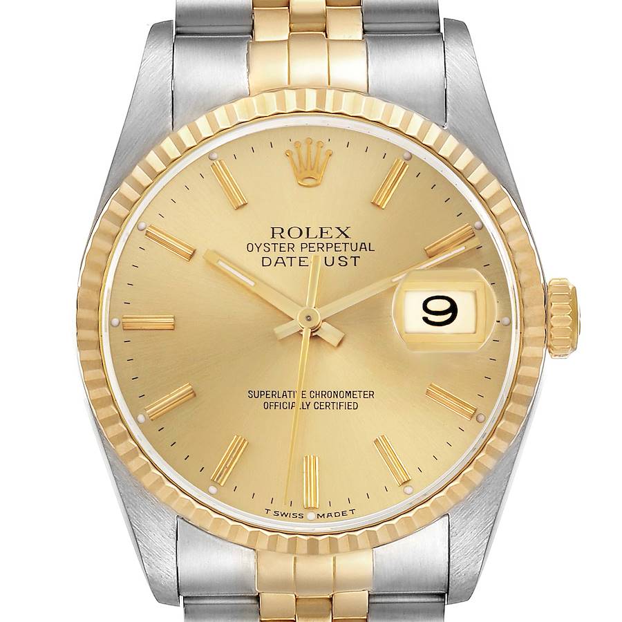The image shows a Rolex Datejust watch from a front angle, highlighting the dial, fluted bezel, and part of the bracelet.