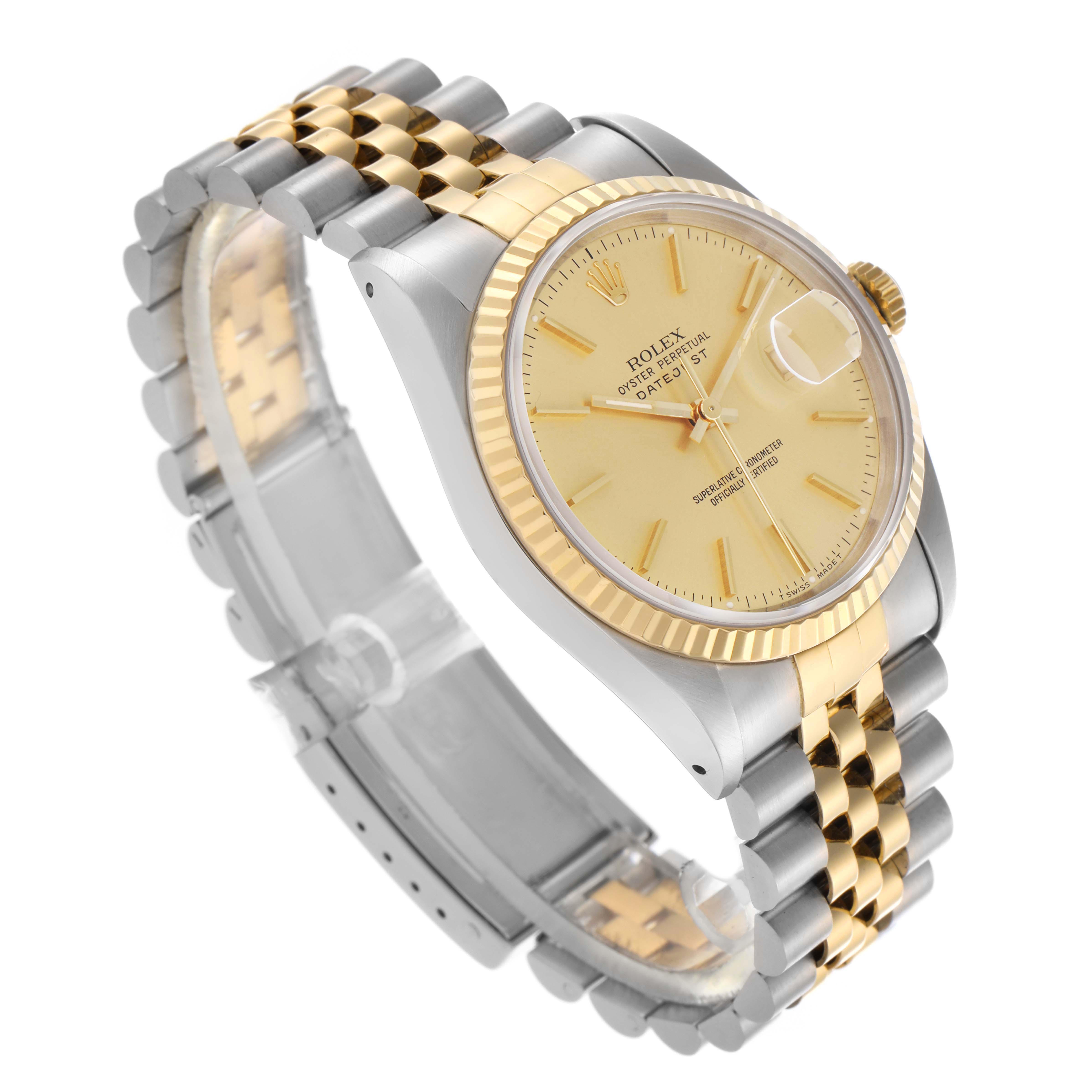 The Rolex Datejust 16233 Men
s Steel and Gold (two tone) Champagne Dial 16233 Men
s Steel and Gold (two tone) Champagne Dial watch is shown at a three-quarter angle, highlighting the dial, bezel, and two-tone bracelet.