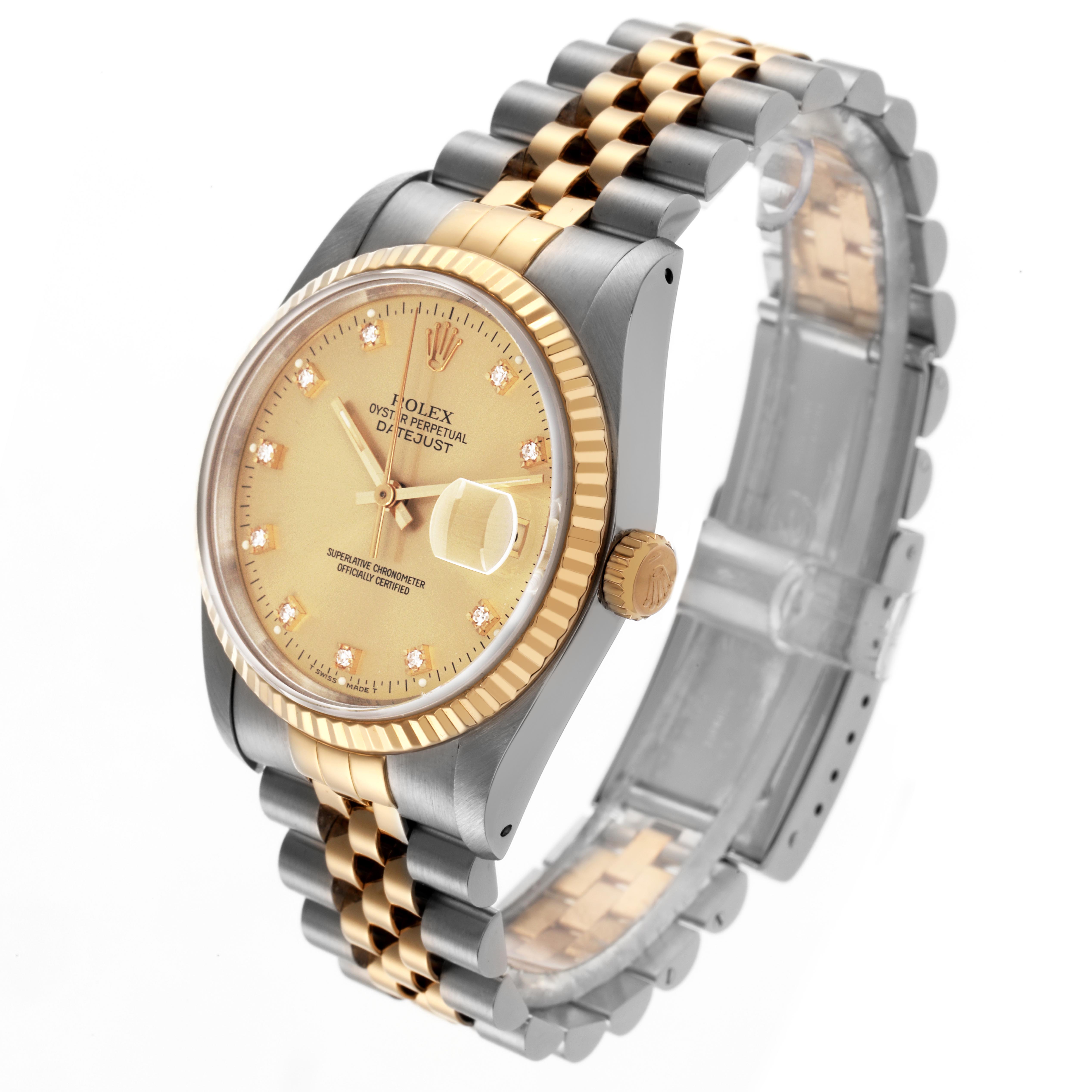 The Rolex Datejust 16233 Men's Steel and Gold (two tone) Champagne Dial 16233 Men's Steel and Gold (two tone) Champagne Dial watch is shown at a slight angle, highlighting the gold fluted bezel, champagne dial, and two-tone Jubilee bracelet.