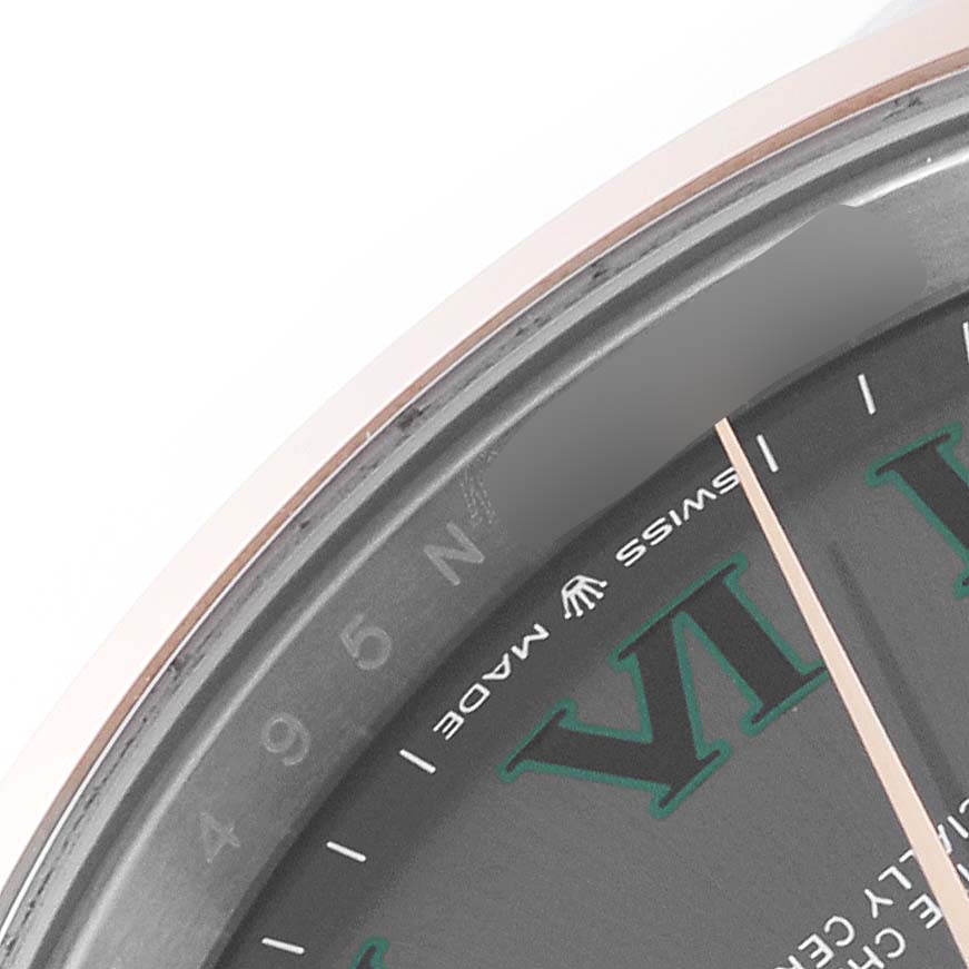 The image shows a close-up of the dial, minute hand, and part of the bezel of the Rolex Datejust 41 126301 Men's Steel and Gold (two tone) Grey Dial 126301 Men's Steel and Gold (two tone) Grey Dial watch.