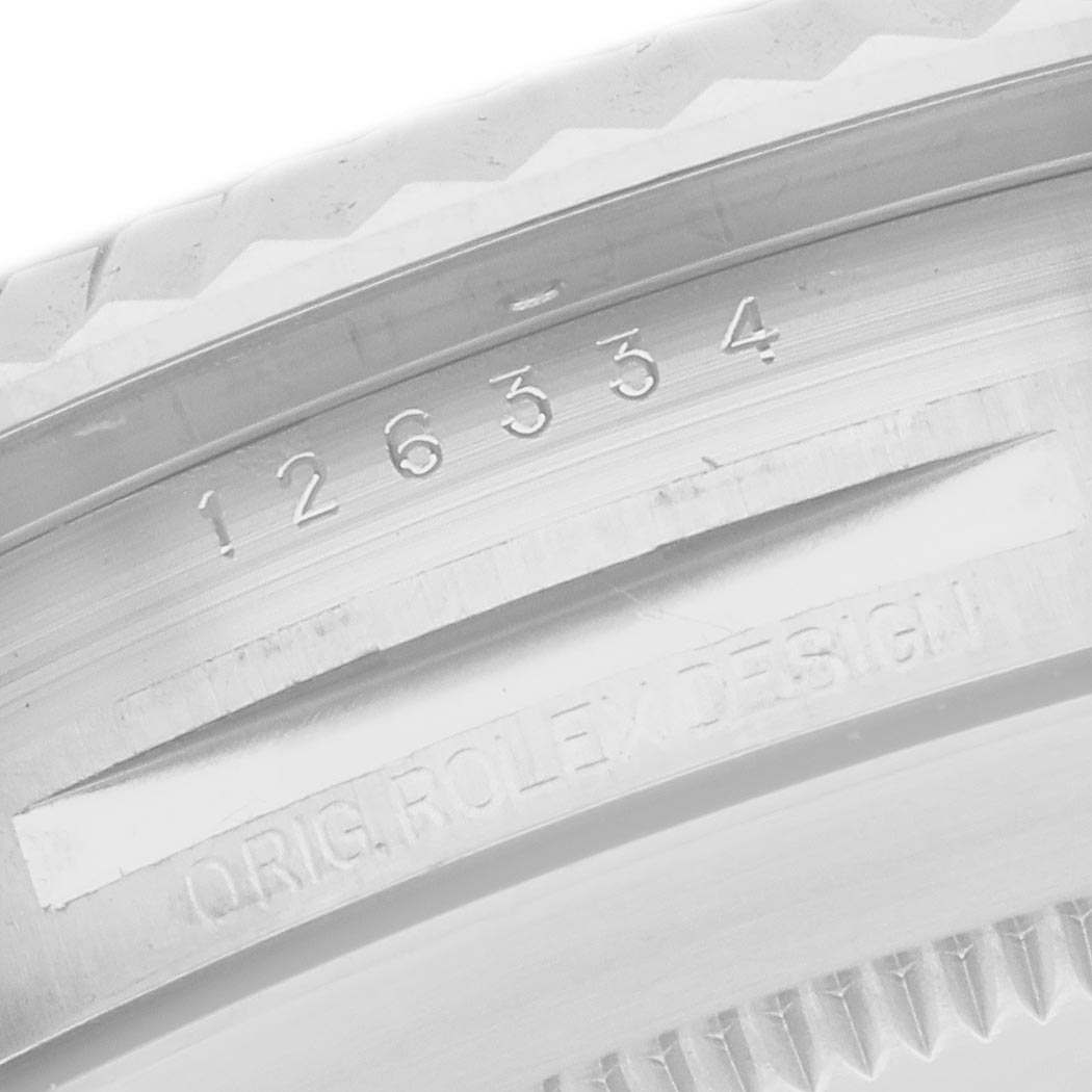 The image shows the inner casing of a Rolex Datejust 41 126334 Men's Stainless Steel Mother of Pearl Dial 126334 Men's Stainless Steel Mother of Pearl Dial, featuring engravings with the model number and "ORIG ROLEX DESIGN."