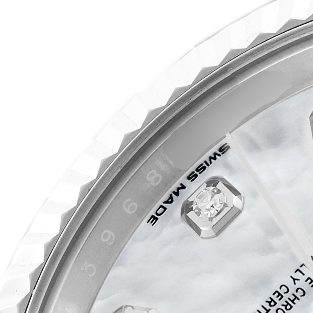 The image shows a partial close-up of the Rolex Datejust 41 126334 Men's Stainless Steel Mother of Pearl Dial 126334 Men's Stainless Steel Mother of Pearl Dial watch, focusing on the bezel, dial, and diamond hour markers.