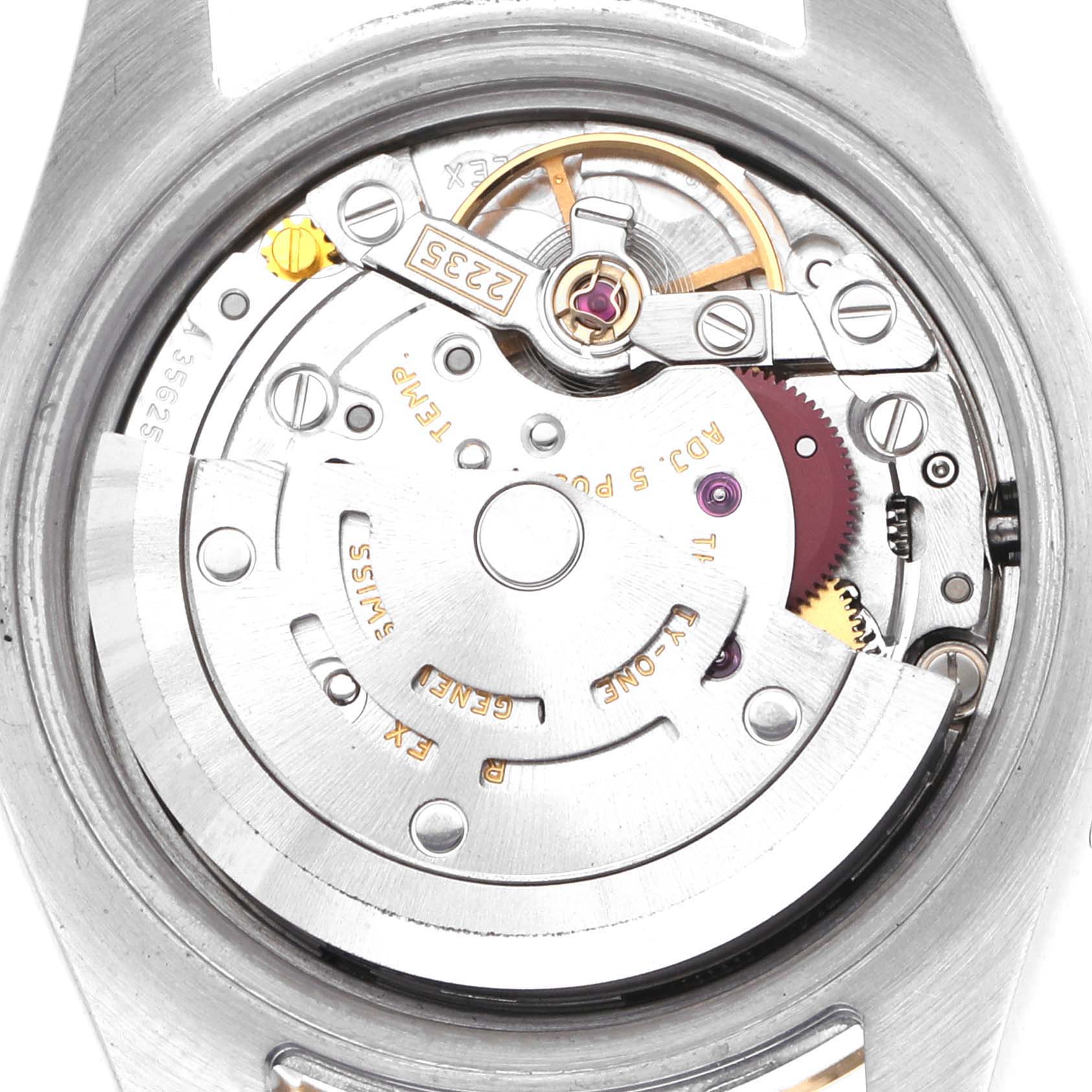 The image shows the movement of a Rolex Datejust 179173 Women's Steel and Gold (two tone) White Dial 179173 Women's Steel and Gold (two tone) White Dial watch, focusing on the intricate mechanical parts inside the case.