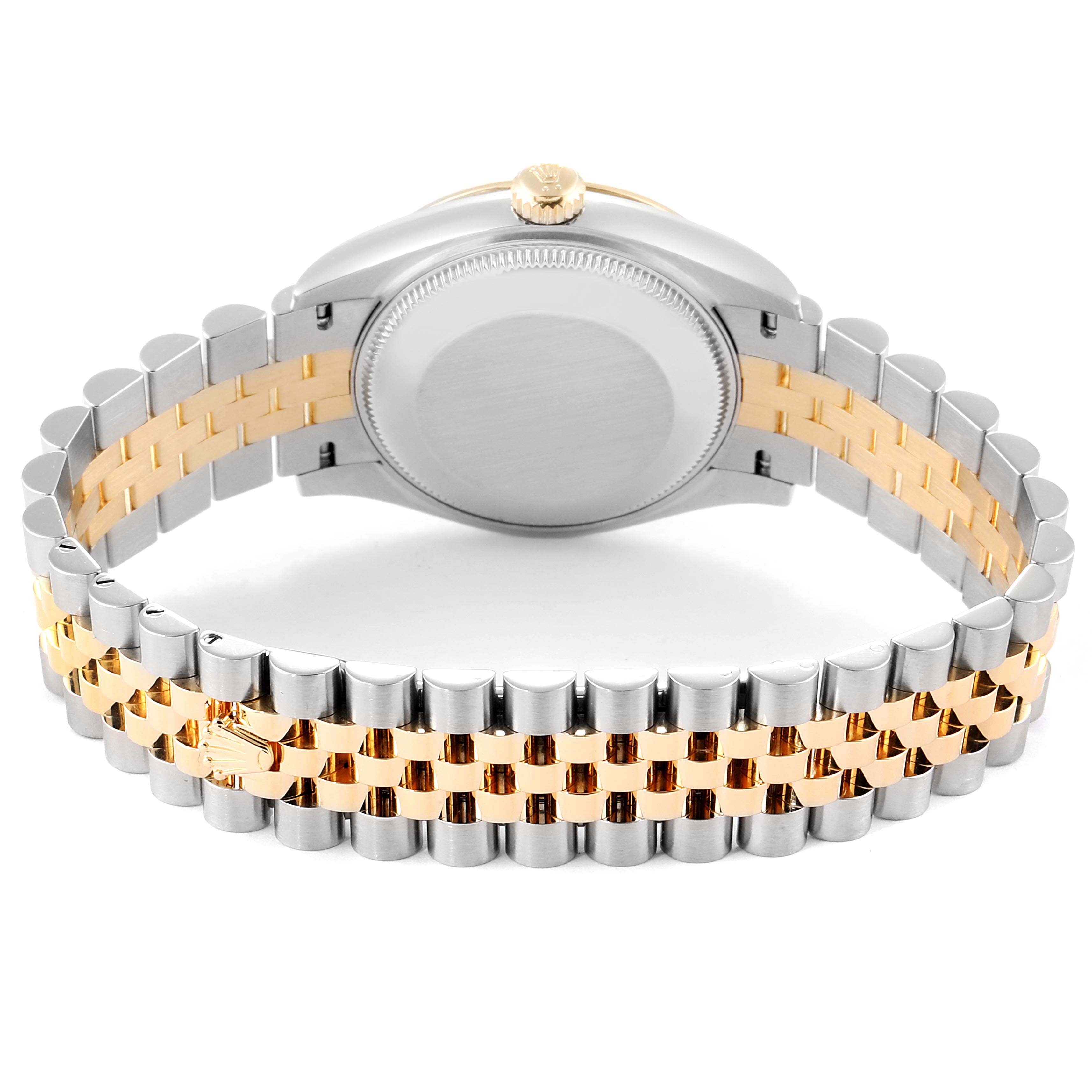 This image shows the back of a Mid-Size Rolex watch and its two-tone metal bracelet.