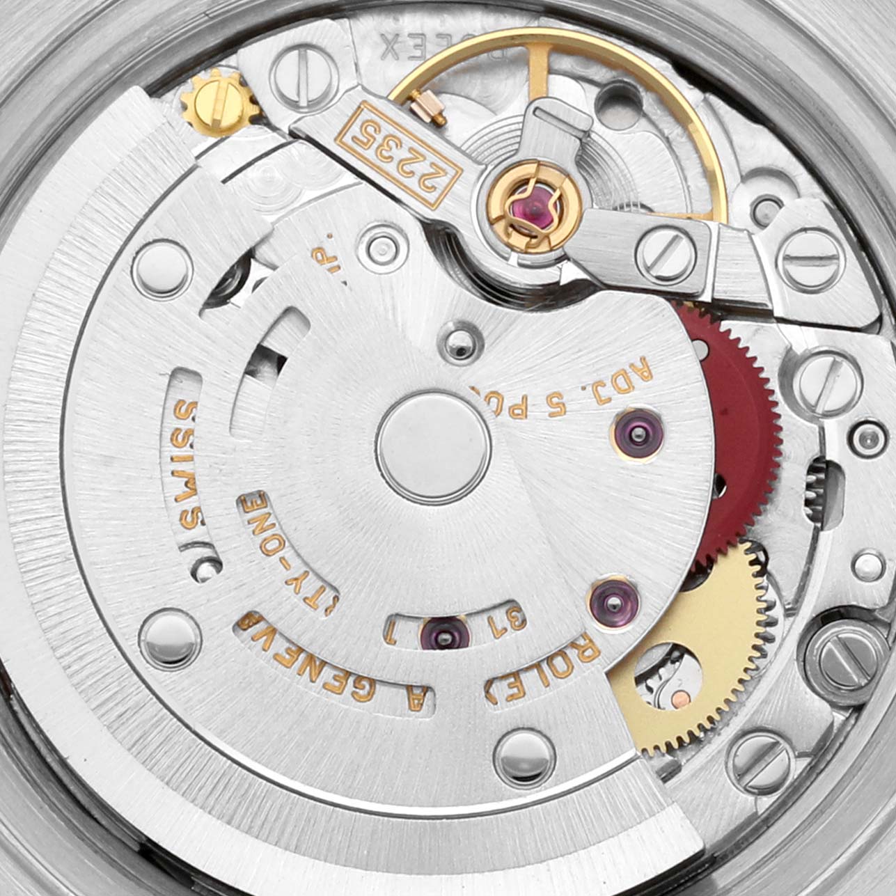 The image shows the Rolex Datejust 79174 Women's Stainless Steel Pink Dial 79174 Women's Stainless Steel Pink Dial's movement mechanism from a close-up, revealing its gears and intricate components.