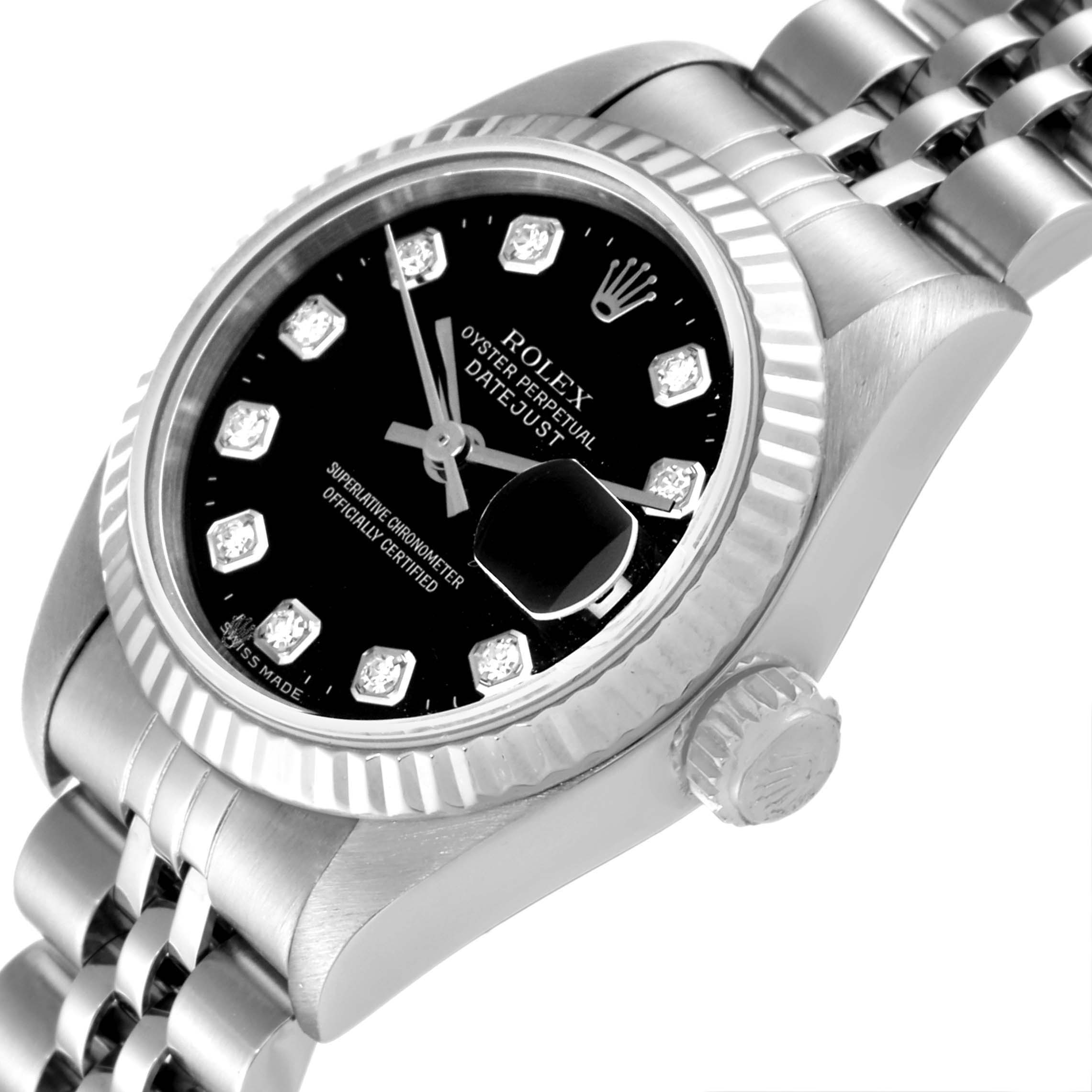 The image shows the Rolex Datejust 79174 Women's Stainless Steel Black Dial 79174 Women's Stainless Steel Black Dial watch at a slight angle, highlighting the black diamond dial, Jubilee bracelet, fluted bezel, and Rolex crown.