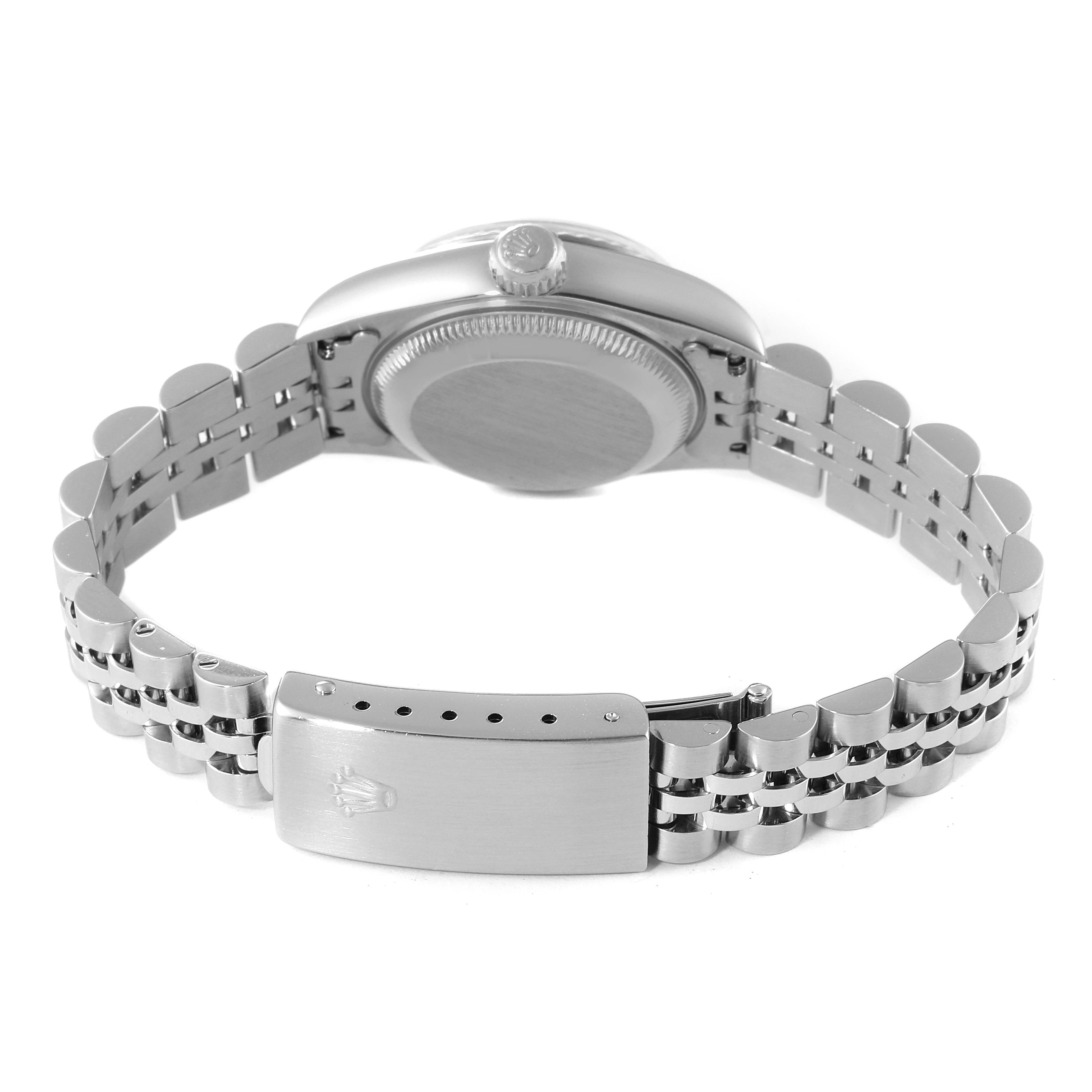 The image shows the back and clasp of a Rolex Datejust 79174 Women's Stainless Steel Black Dial 79174 Women's Stainless Steel Black Dial watch, highlighting its bracelet and caseback.