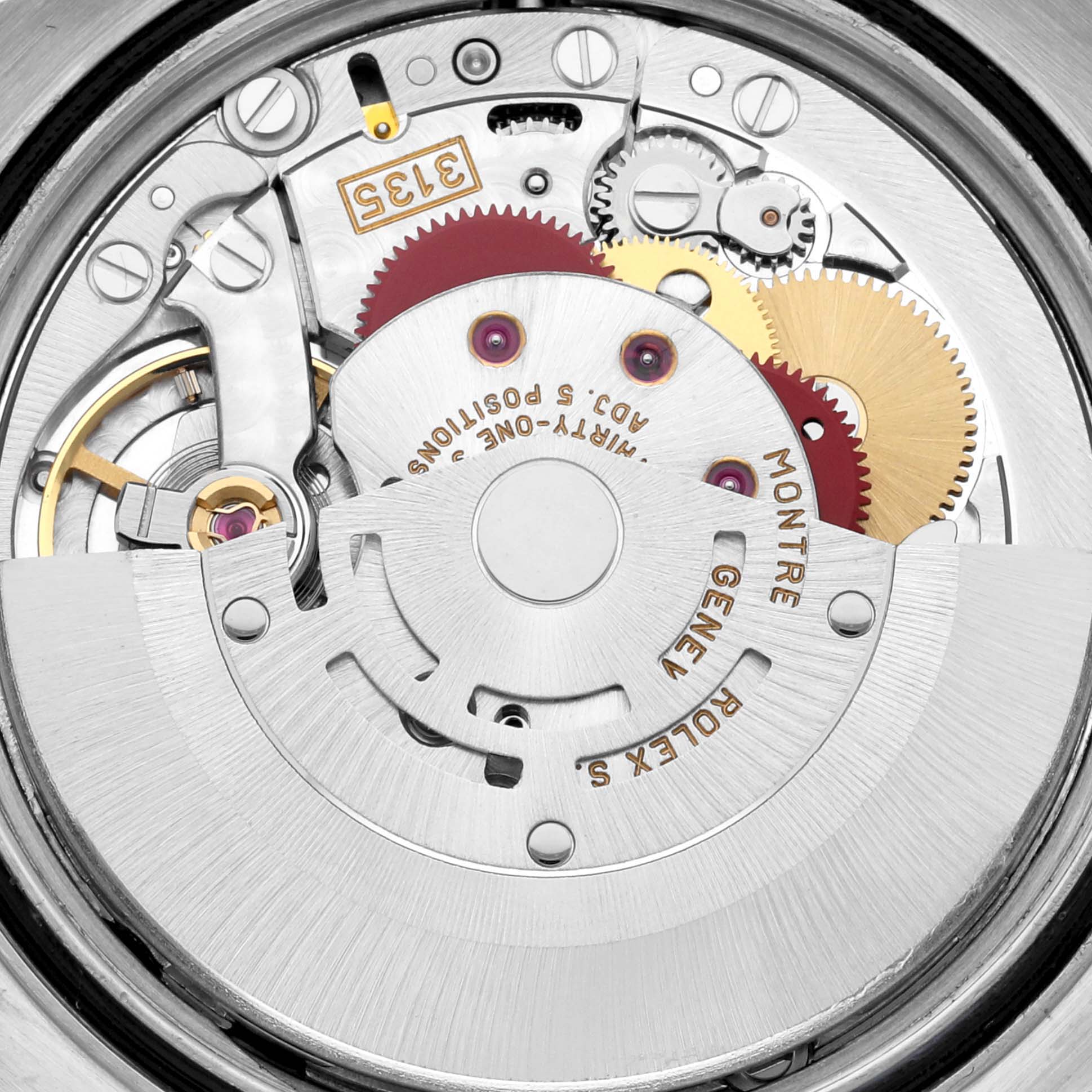 This image shows a close-up view of the inner mechanical movement of a Rolex Datejust 16234G Men's Stainless Steel Mother of Pearl Dial 16234G Men's Stainless Steel Mother of Pearl Dial watch, revealing gears and components.