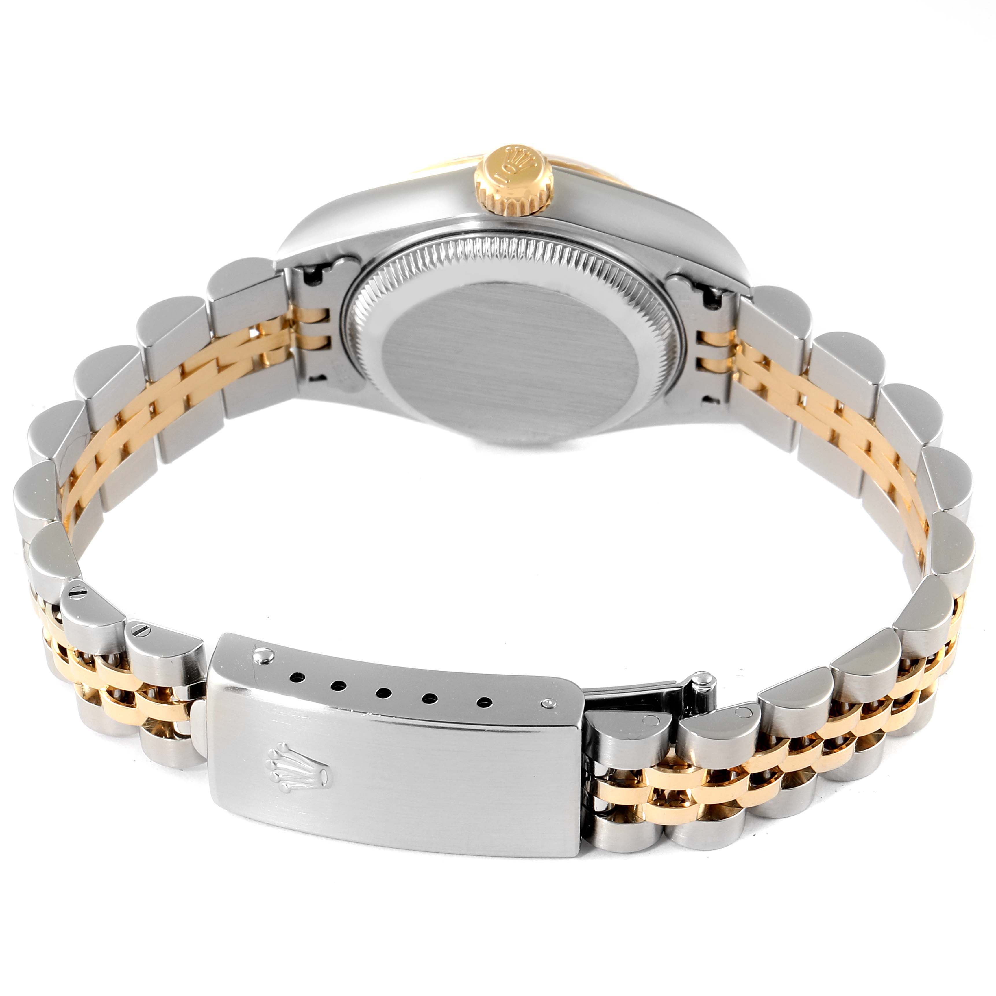 The image shows the back of the Rolex Datejust 79173 Women's Steel and Gold (two tone) Mother of Pearl Dial 79173 Women's Steel and Gold (two tone) Mother of Pearl Dial watch, including the case back and the bracelet clasp.