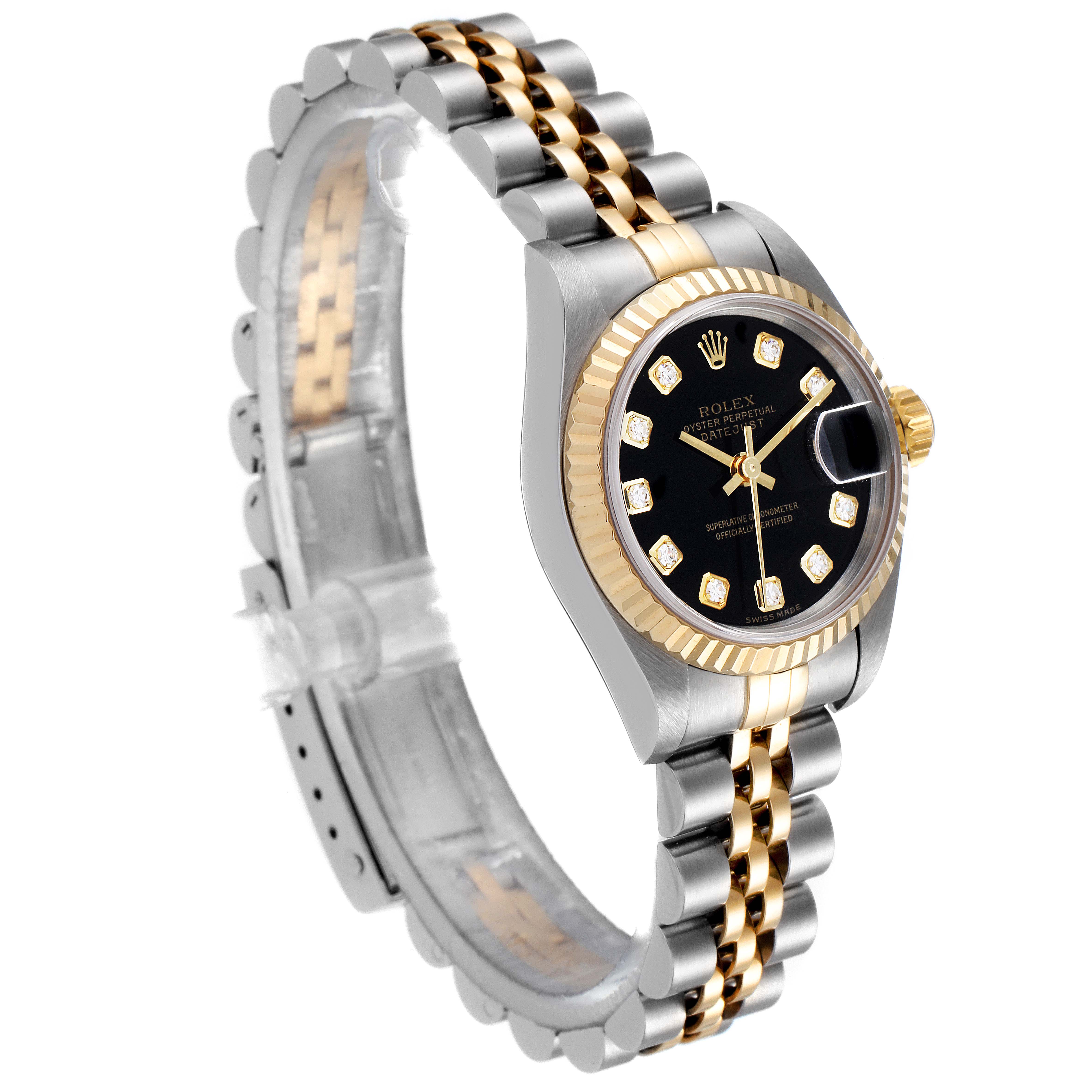 The Rolex Datejust 79173 Women's Steel and Gold (two tone) Black Dial 79173 Women's Steel and Gold (two tone) Black Dial watch is shown at a three-quarter angle, displaying its bezel, dial, and two-tone bracelet.
