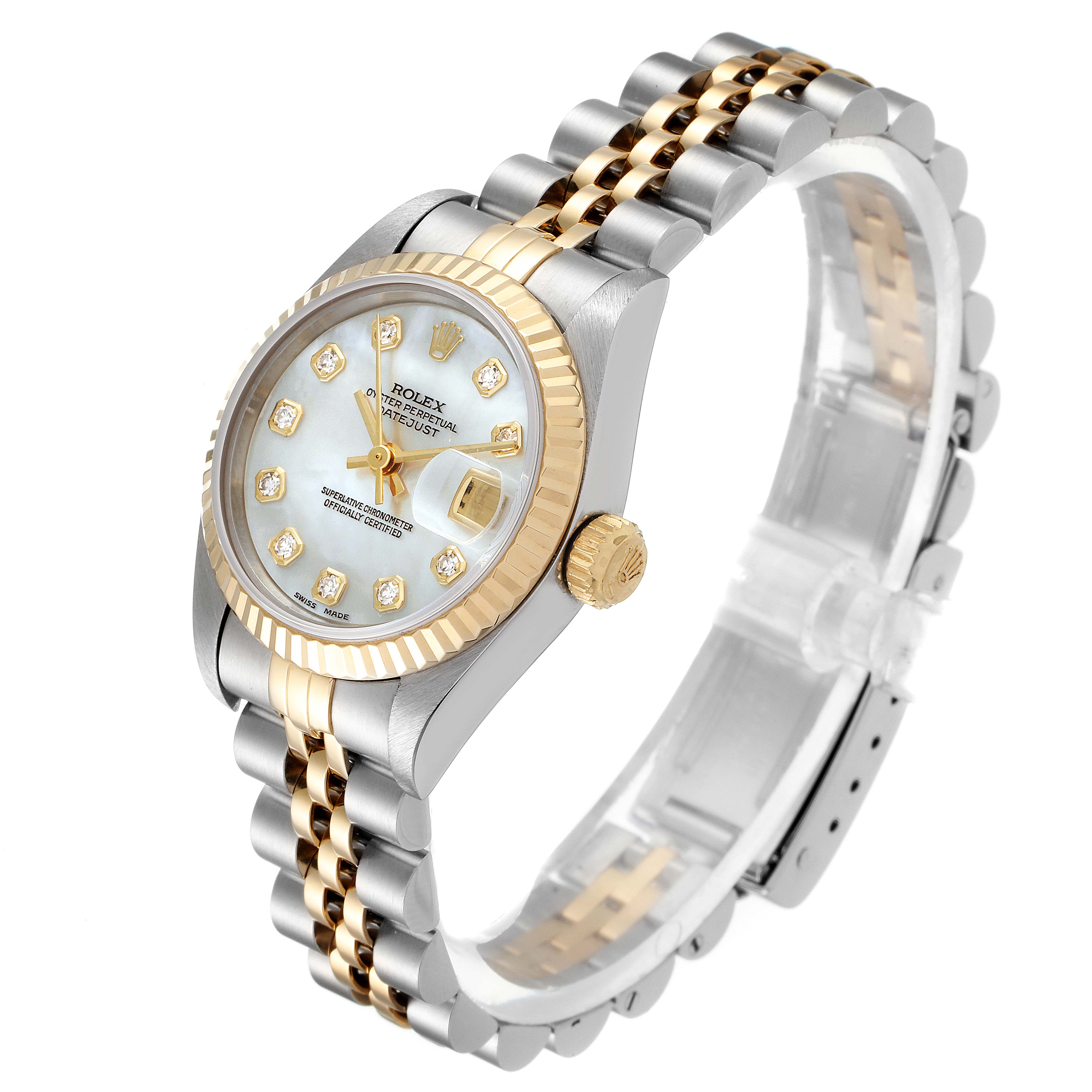 This image shows a Rolex Datejust 69173 Women's Steel and Gold (two tone) Mother of Pearl Dial 69173 Women's Steel and Gold (two tone) Mother of Pearl Dial watch at an angle displaying the face, bezel, crown, and part of the bracelet.