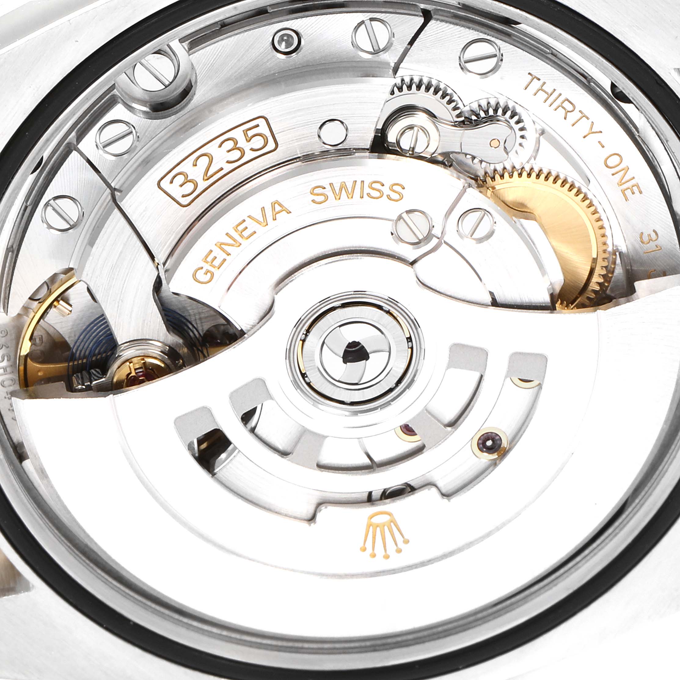 The image shows the intricate movement and interior mechanism of a Rolex Datejust 126233 Men's Steel and Gold (two tone) Silver Dial 126233 Men's Steel and Gold (two tone) Silver Dial watch.