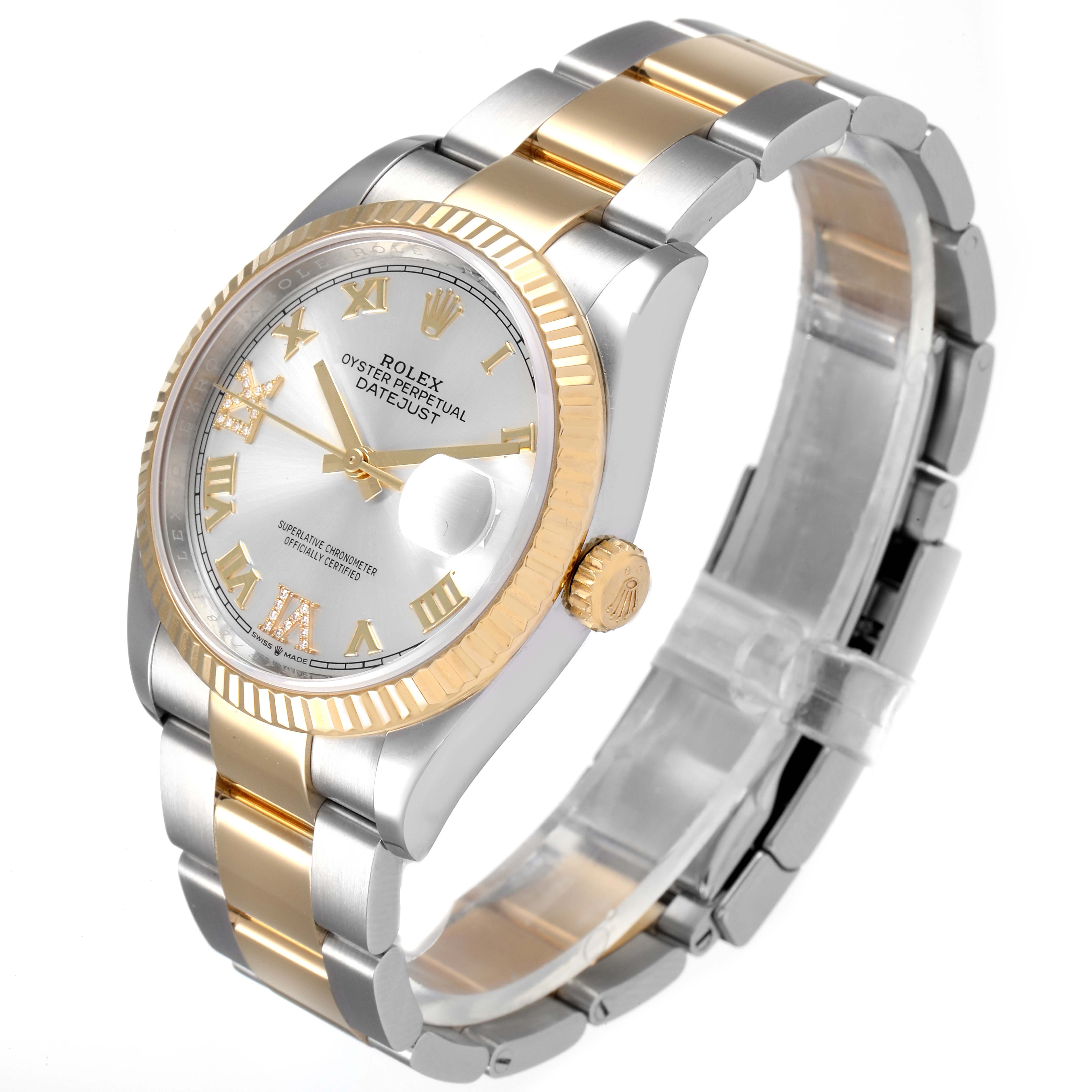 The image shows a Rolex Datejust 126233 Men's Steel and Gold (two tone) Silver Dial 126233 Men's Steel and Gold (two tone) Silver Dial watch from a front-side angle, highlighting its two-tone bracelet, fluted bezel, and silver dial.