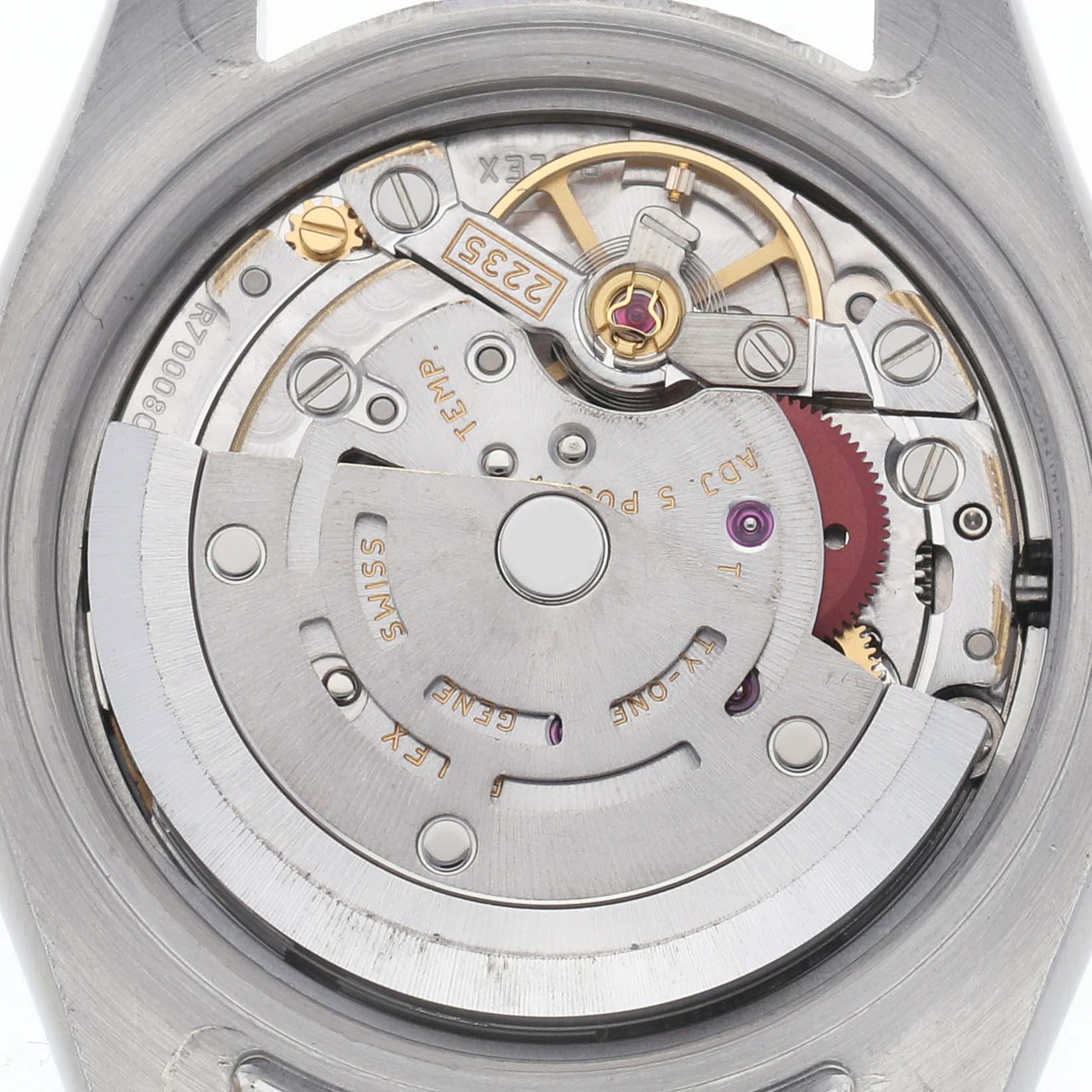 The image shows the movement mechanism of a Rolex Datejust 179173 Women's Steel and Gold (two tone) White Dial 179173 Women's Steel and Gold (two tone) White Dial, viewed from the back, highlighting gears and components.