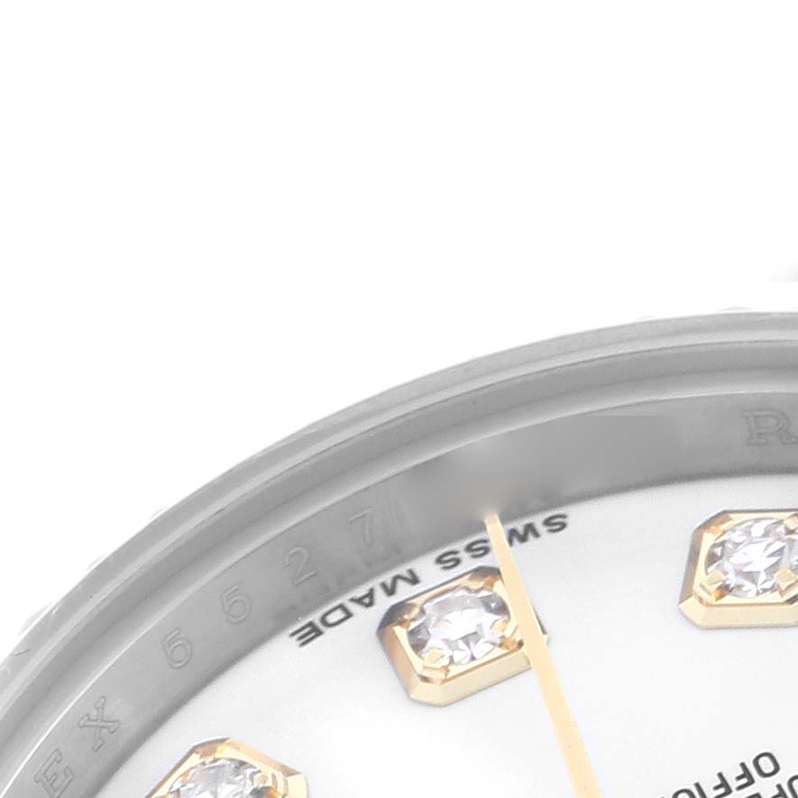 The image shows a close-up of the dial and bezel of a Rolex Datejust 179173 Women's Steel and Gold (two tone) White Dial 179173 Women's Steel and Gold (two tone) White Dial, highlighting the diamond hour markers and the "Swiss Made" text.