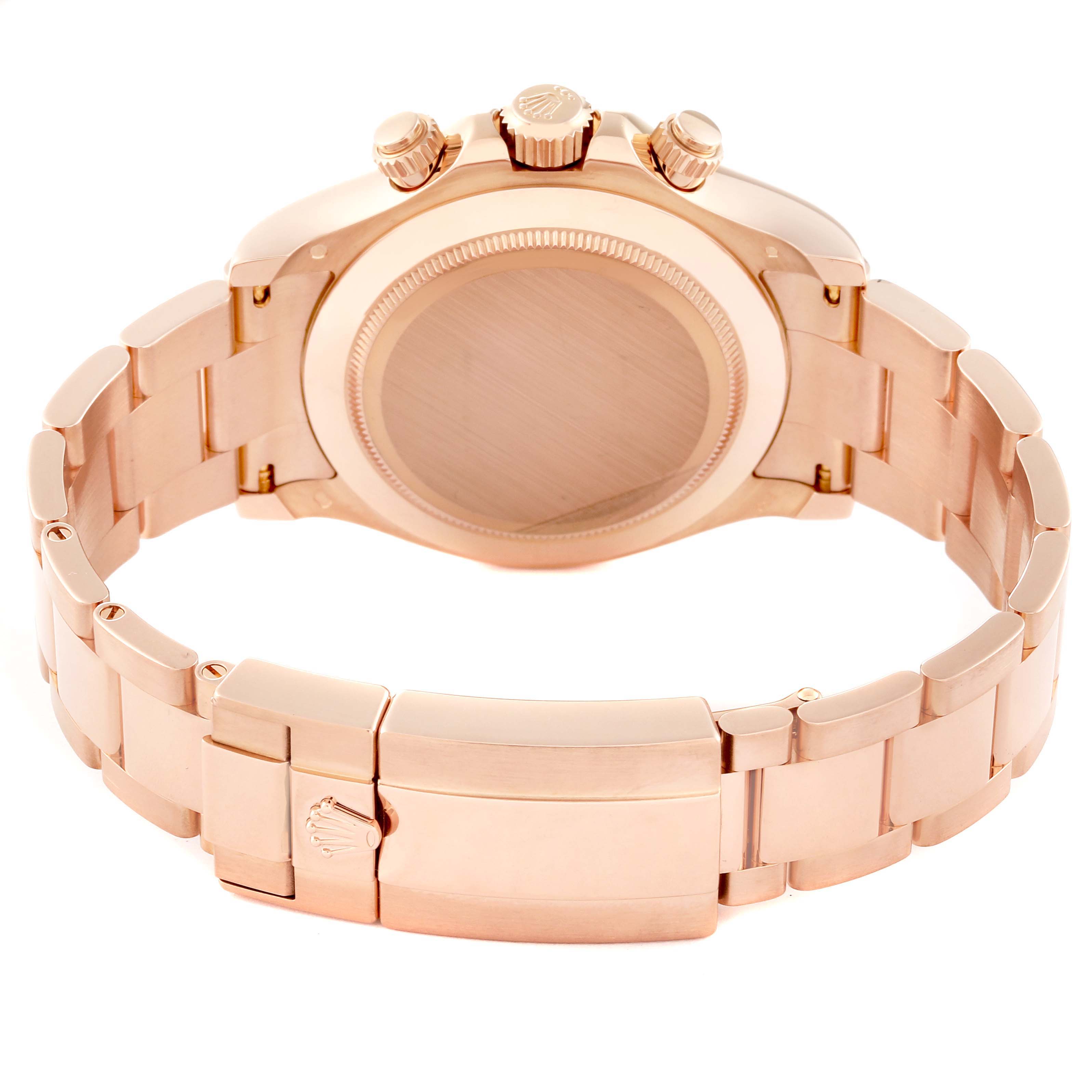 This image shows the backside of a Rolex Daytona 116505 Men's Rose Gold Black Dial 116505 Men's Rose Gold Black Dial watch, highlighting the case back, bracelet, and clasp.