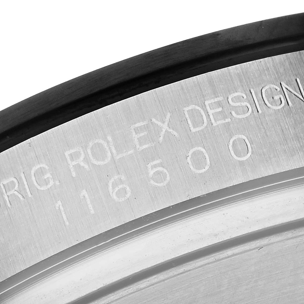 The image shows a close-up of the engraved model number "116500" on the case of a Rolex Daytona 116500LN Men's Stainless Steel Black Dial 116500LN Men's Stainless Steel Black Dial watch.