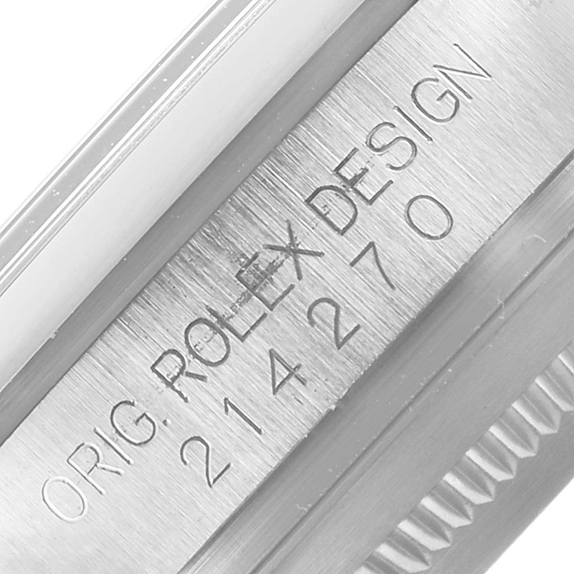 The image shows a close-up of the case with an engraving for a Rolex Explorer 214270 Men
s Stainless Steel Black Dial 214270 Men
s Stainless Steel Black Dial watch displaying the text "ORIG. ROLEX DESIGN 214270".