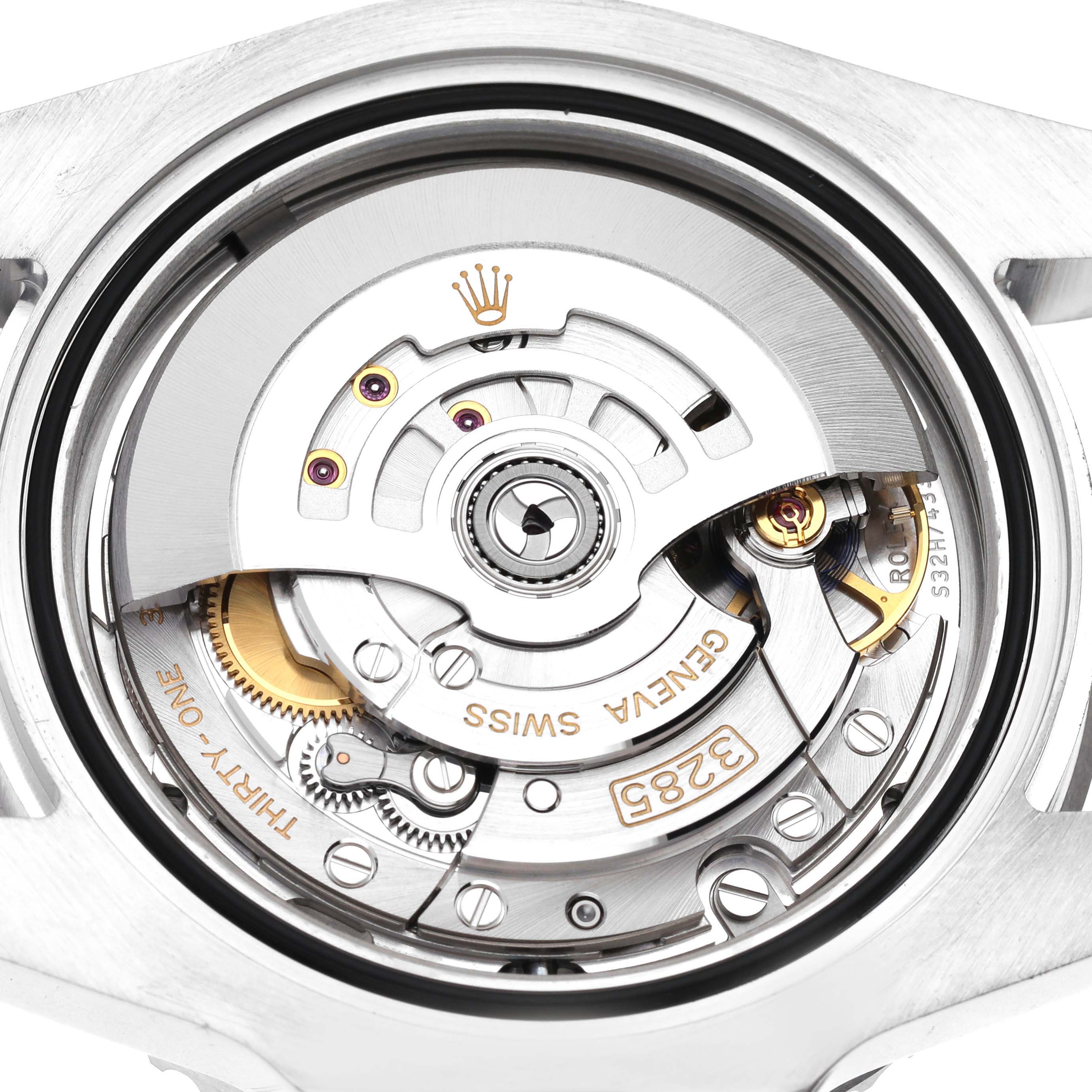 This image shows the movement mechanism of a Rolex GMT-Master 126710BLNR Men
s Stainless Steel Black Dial 126710BLNR Men
s Stainless Steel Black Dial watch from a back angle.