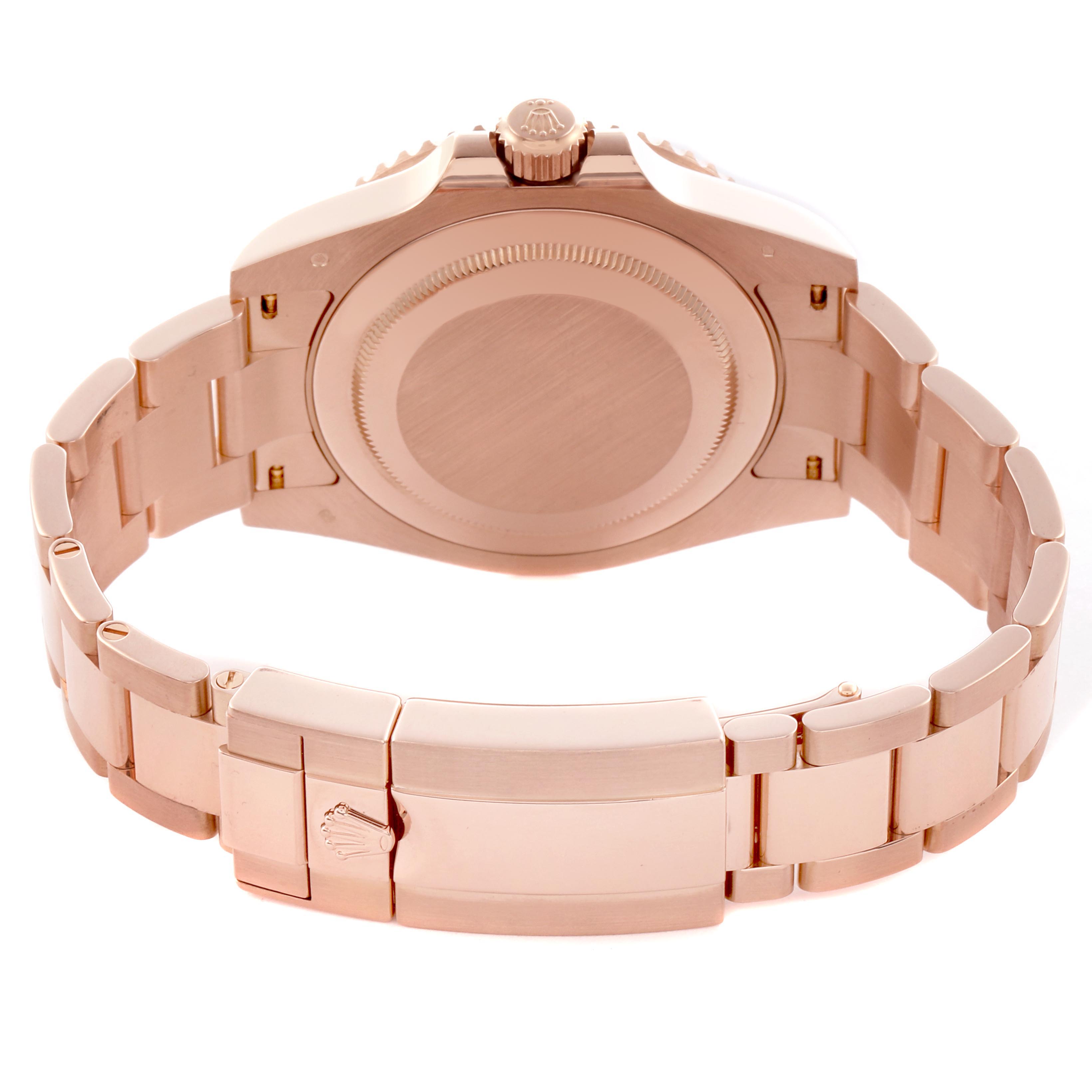 The image shows the back case and bracelet of a Rolex GMT-Master 126715CHNR Men
s Rose Gold Black Dial 126715CHNR Men
s Rose Gold Black Dial, viewed from behind.