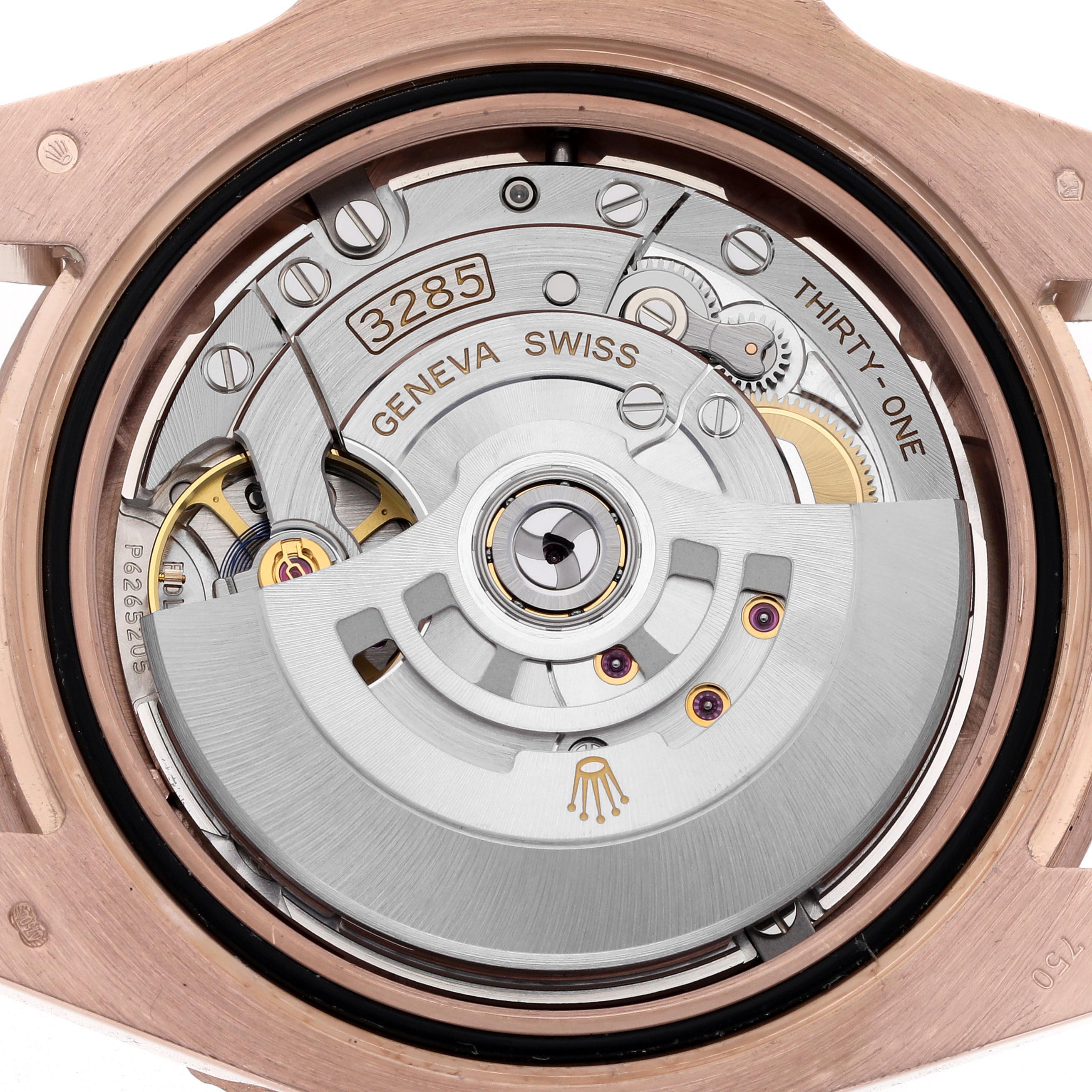 The image shows the movement of a Rolex GMT-Master 126715CHNR Men
s Rose Gold Black Dial 126715CHNR Men
s Rose Gold Black Dial, viewed from the back, displaying intricate mechanical details.