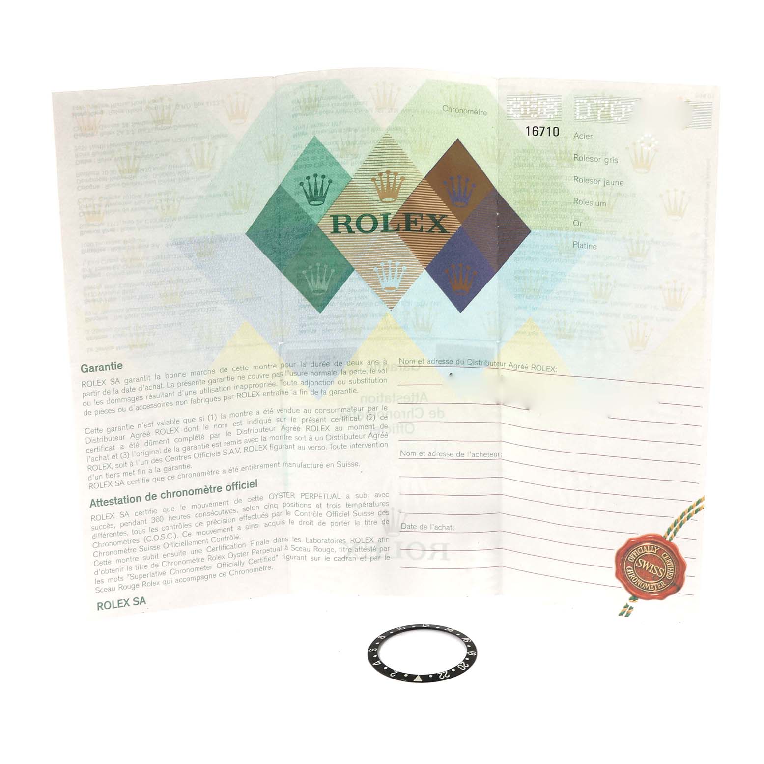 The image shows the warranty card and a detached bezel for the Rolex GMT-Master 16710 Men's Stainless Steel Black Dial 16710 Men's Stainless Steel Black Dial watch.