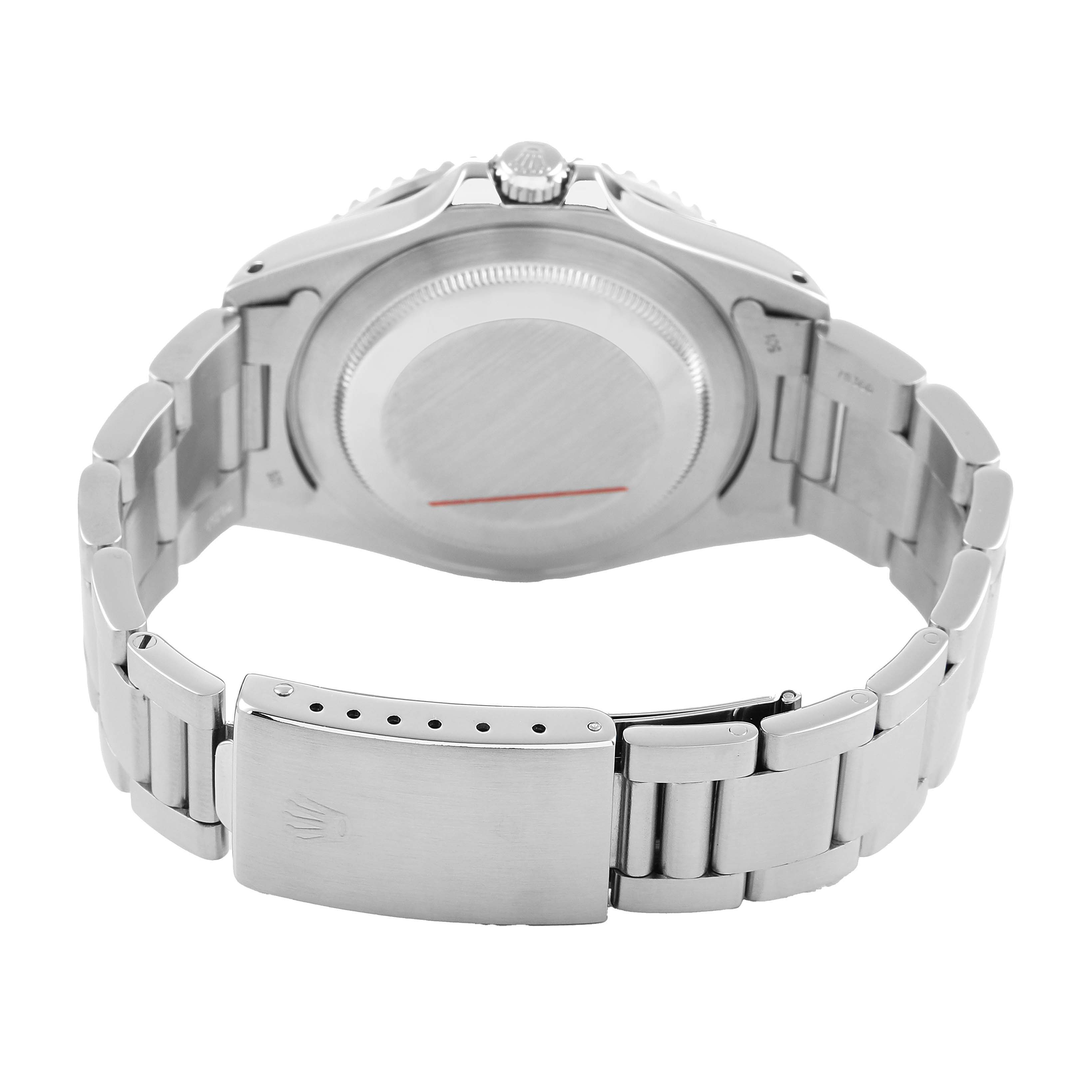 The image shows the back view of a Rolex GMT-Master 16700 Men's Stainless Steel Black Dial watch, highlighting the case back and bracelet clasp.