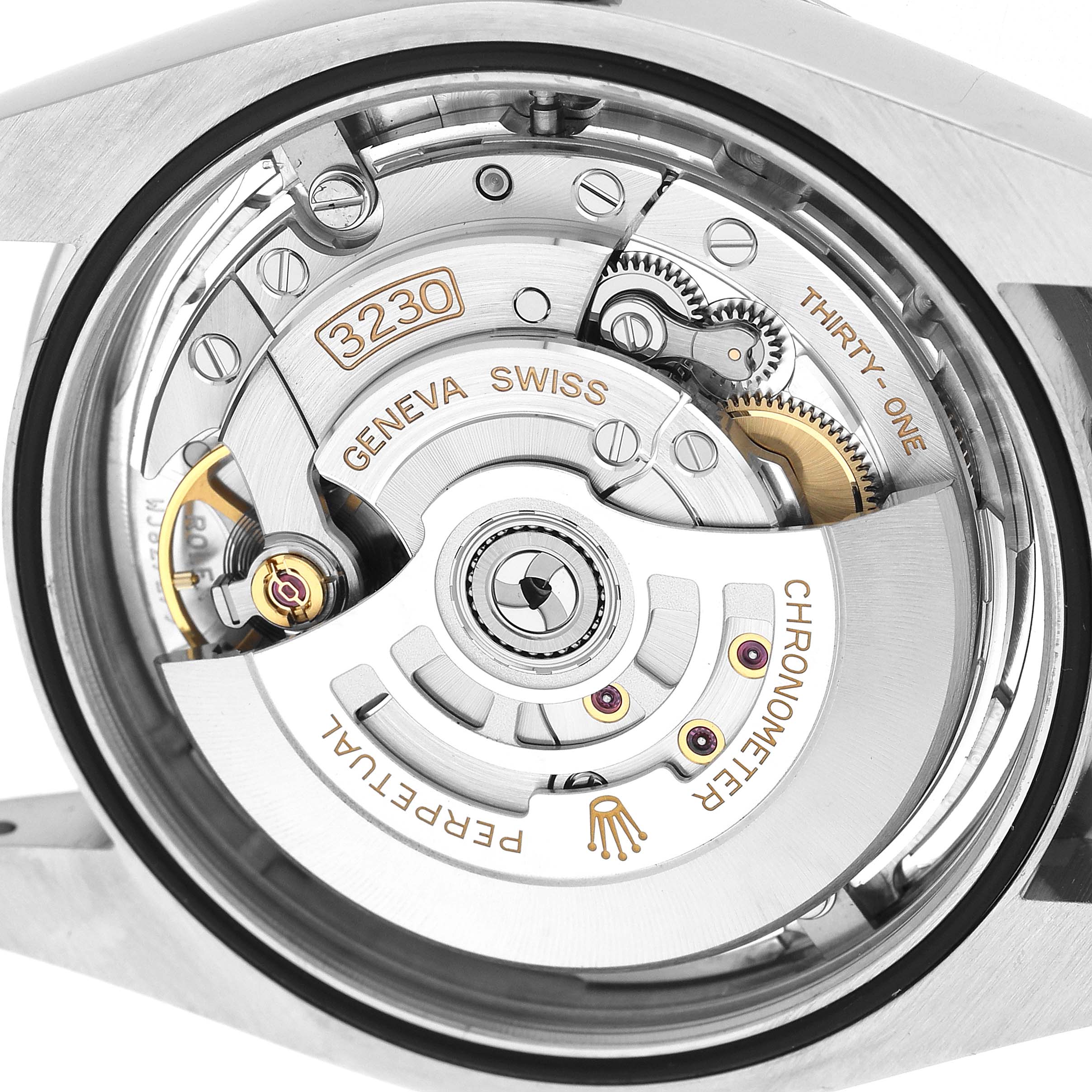 The image shows the movement and interior mechanics of the Rolex Oyster Perpetual 124300 Men's Stainless Steel Silver Dial watch from the back angle, highlighting its components.