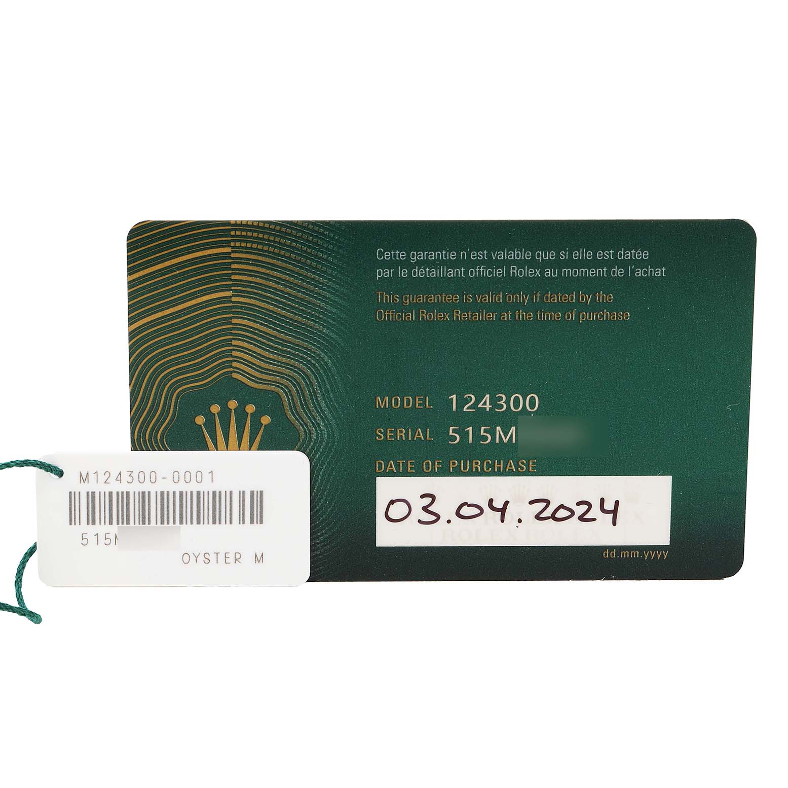 The image shows a warranty card and tag for the Rolex Oyster Perpetual 124300 Men's Stainless Steel Silver Dial model, displaying model and serial numbers.