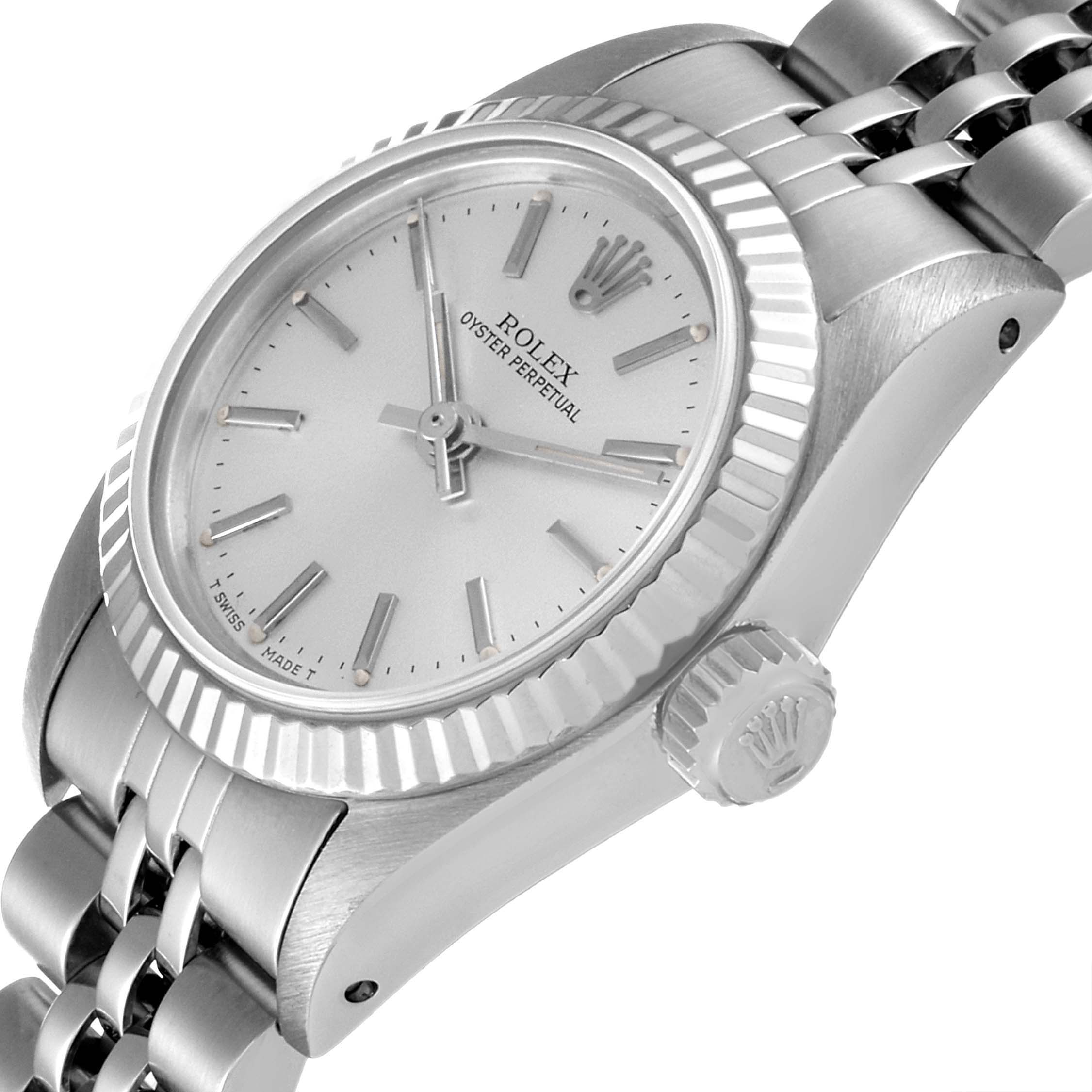 This Rolex Oyster Perpetual 67194 Women
s Stainless Steel Silver Dial 67194 Women
s Stainless Steel Silver Dial watch is shown from a three-quarter angle, highlighting the dial, bezel, crown, and part of the bracelet.