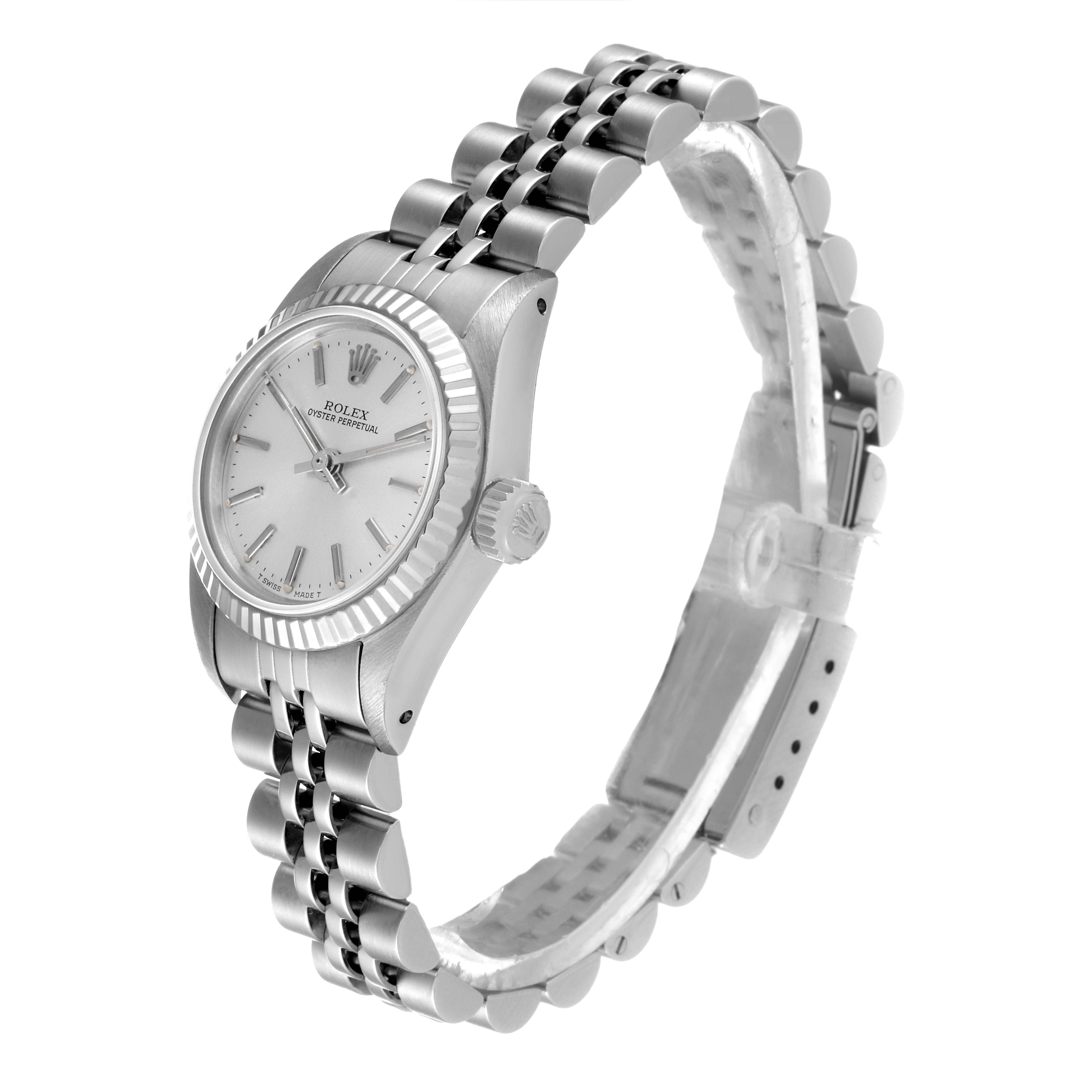 The image shows a side and angled front view of a Rolex Oyster Perpetual 67194 Women
s Stainless Steel Silver Dial 67194 Women
s Stainless Steel Silver Dial watch with its dial, crown, and bracelet visible.