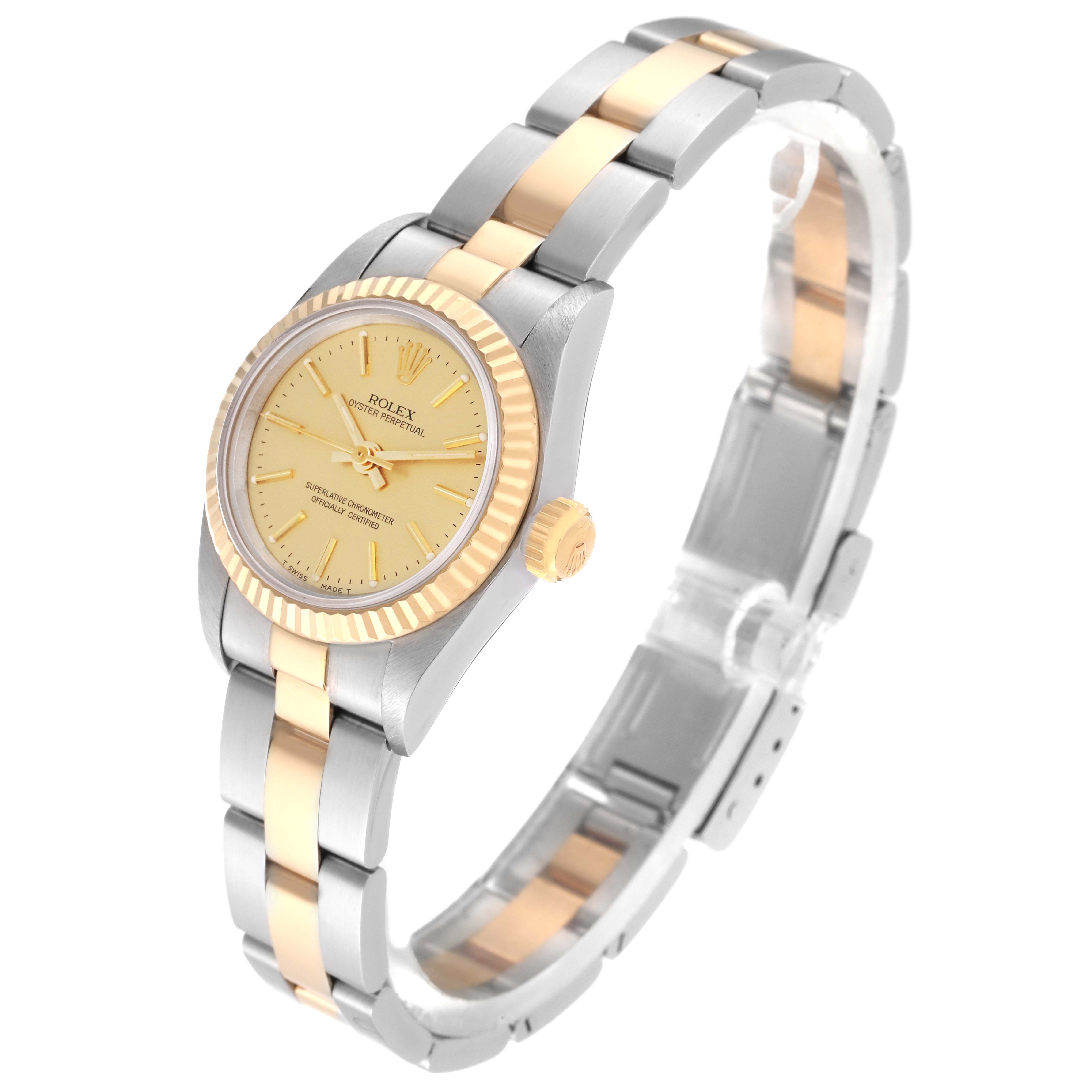 The image shows a Rolex Oyster Perpetual 67193 Women's Steel and Gold (two tone) Champagne Dial 67193 Women's Steel and Gold (two tone) Champagne Dial watch at a slight angle, highlighting its face, bezel, crown, and bracelet.