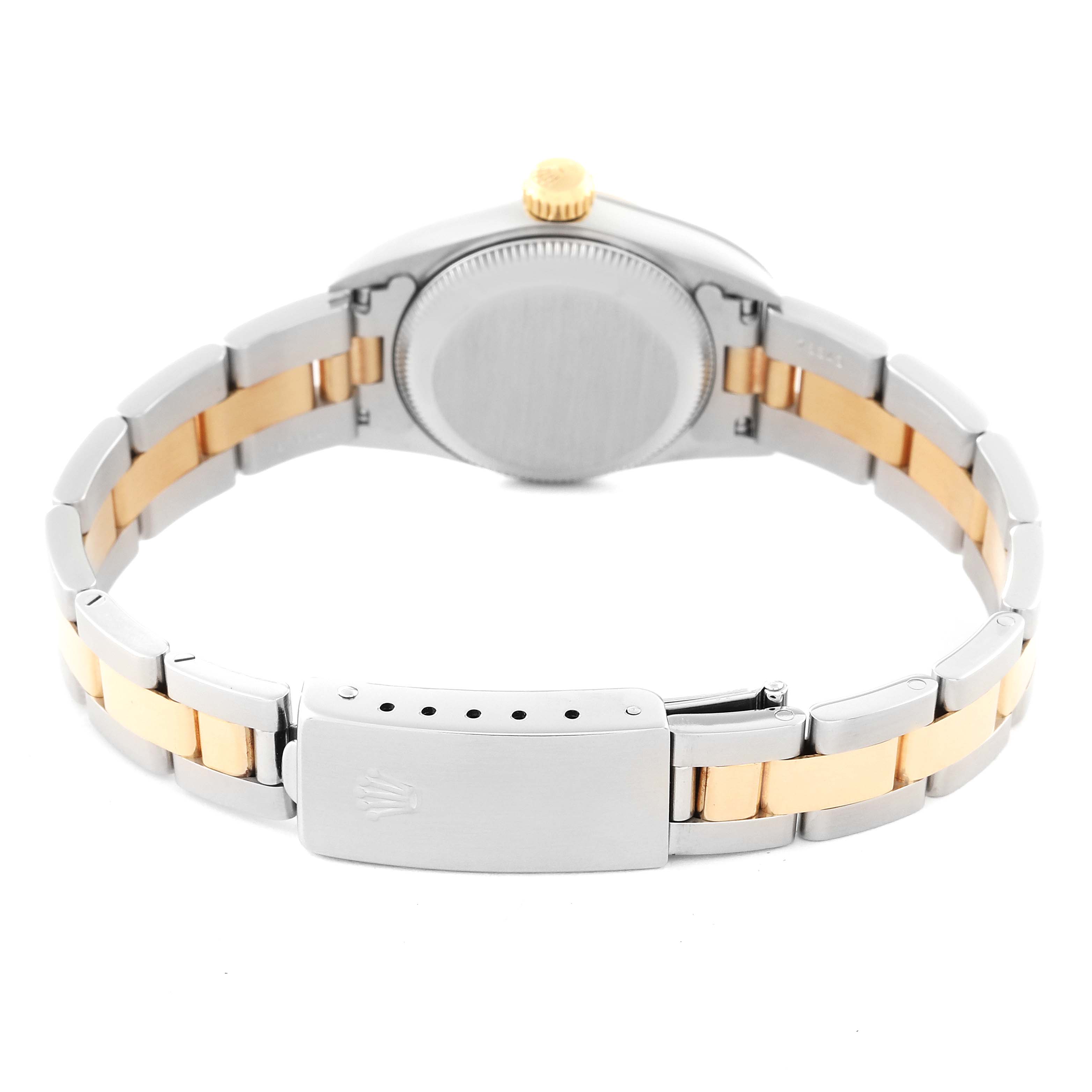 The image shows the back view of a Rolex Oyster Perpetual 67193 Women's Steel and Gold (two tone) Champagne Dial 67193 Women's Steel and Gold (two tone) Champagne Dial watch, focusing on the case back and bracelet with a clasp.