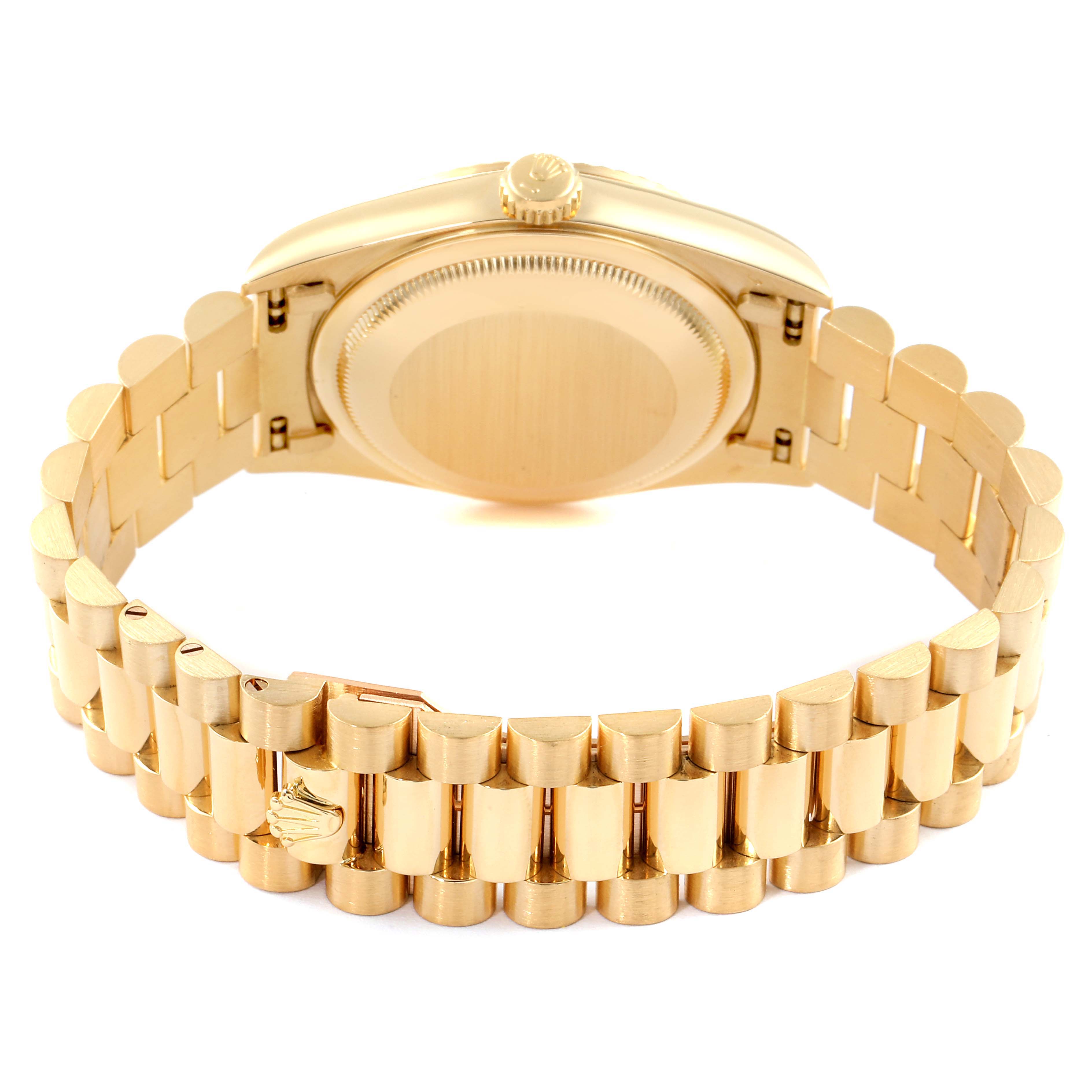 The image shows the backside of a Rolex President 18238 Men's Yellow Gold Champagne Dial 18238 Men's Yellow Gold Champagne Dial model, displaying the case back and the full gold bracelet with the clasp.