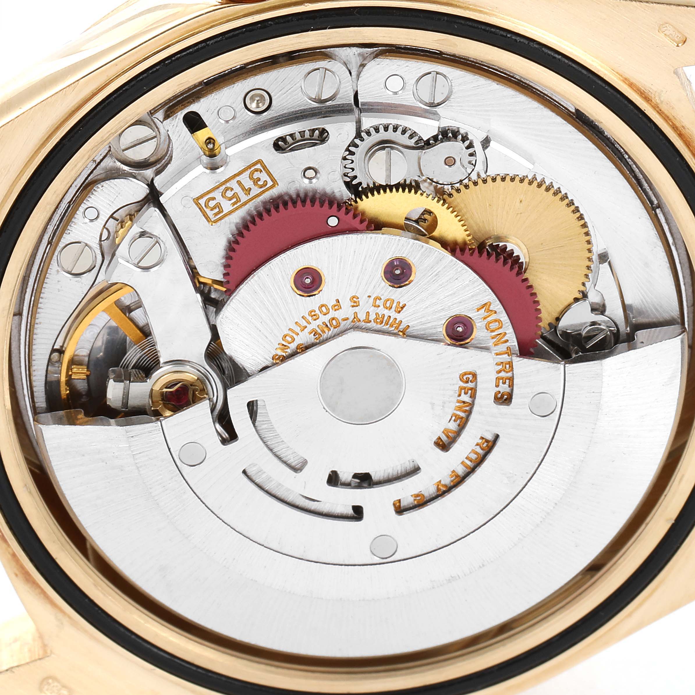 This image shows the internal mechanical components of a Rolex President 18238 Men's Yellow Gold Champagne Dial 18238 Men's Yellow Gold Champagne Dial model watch from an open caseback angle.