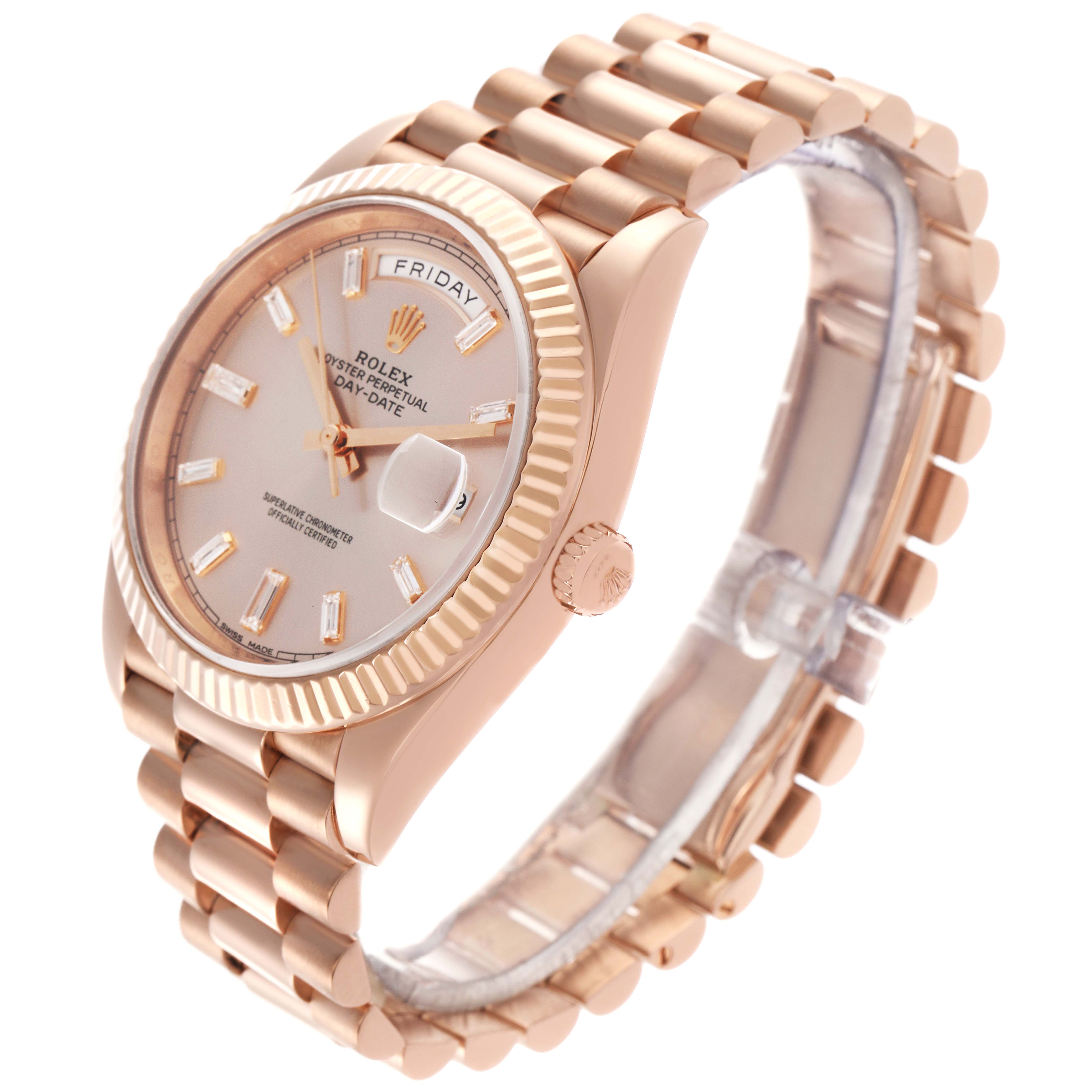 The Rolex President 228235 Men's Rose Gold Pink Dial 228235 Men's Rose Gold Pink Dial watch is shown at a three-quarter angle, displaying the bracelet, bezel, dial, and crown.
