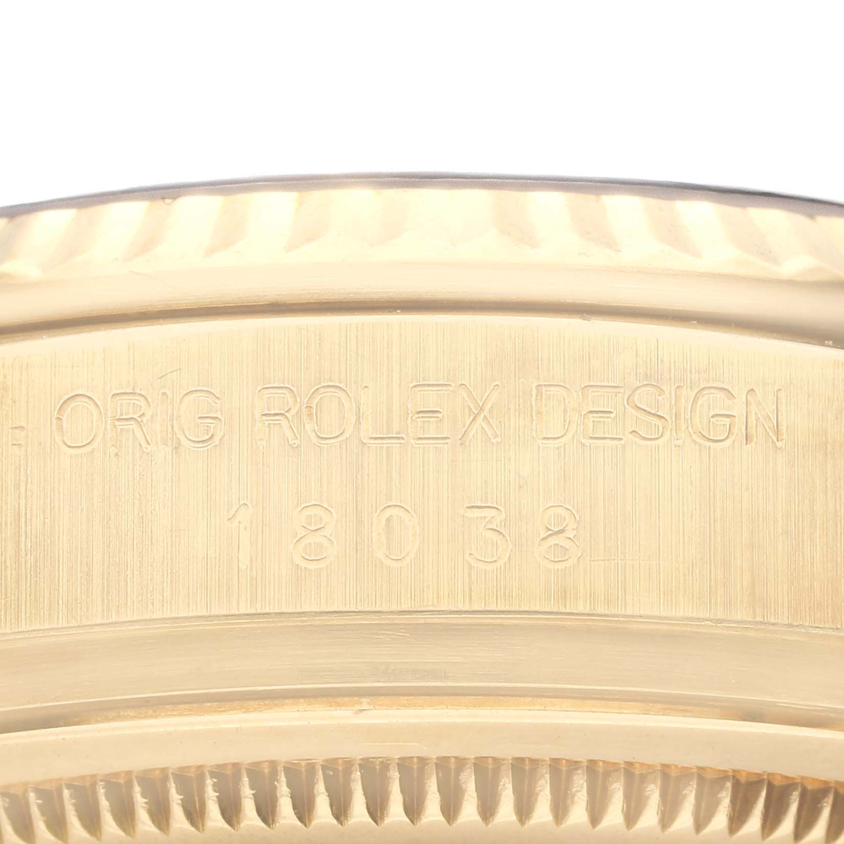 This image shows a close-up of the side engraving on the Rolex President 18038 Men's Yellow Gold Black Dial 18038 Men's Yellow Gold Black Dial model watch case, featuring its design number 18038.