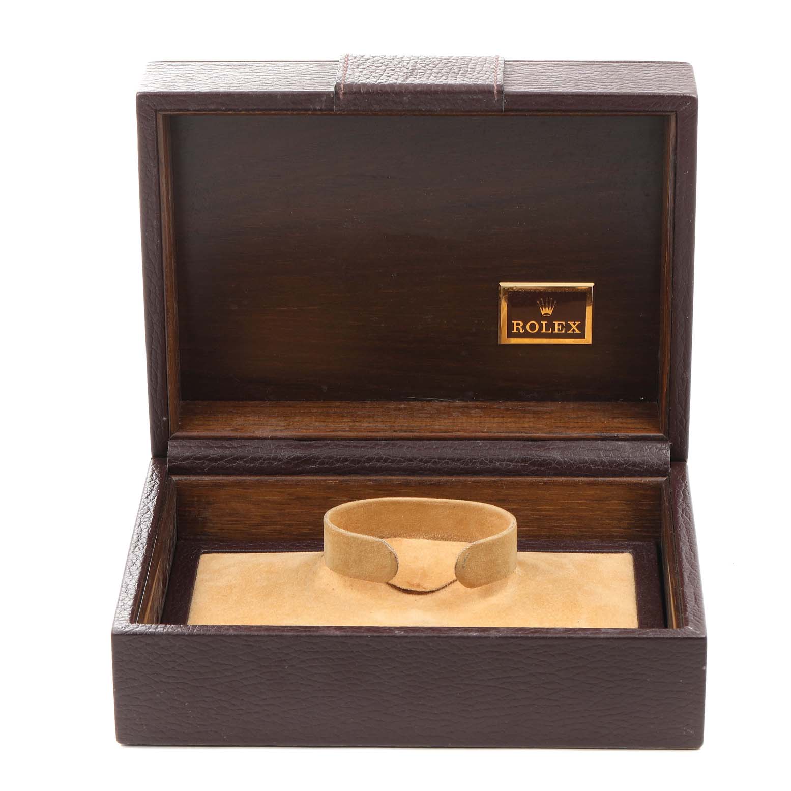 This image shows an open Rolex box for the President model, displaying its inner cushion and branding.