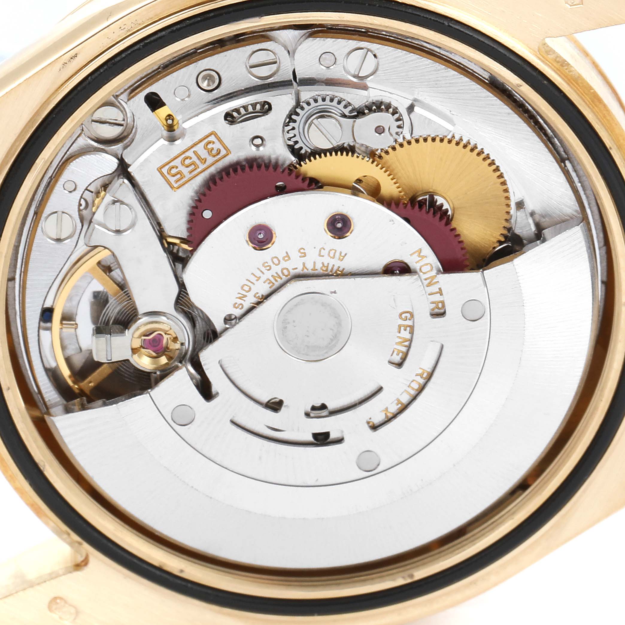 This is a close-up view of the internal mechanism of a Rolex President 118238 Men's Yellow Gold Mother of Pearl Dial 118238 Men's Yellow Gold Mother of Pearl Dial model watch, showcasing its intricate gears and components.