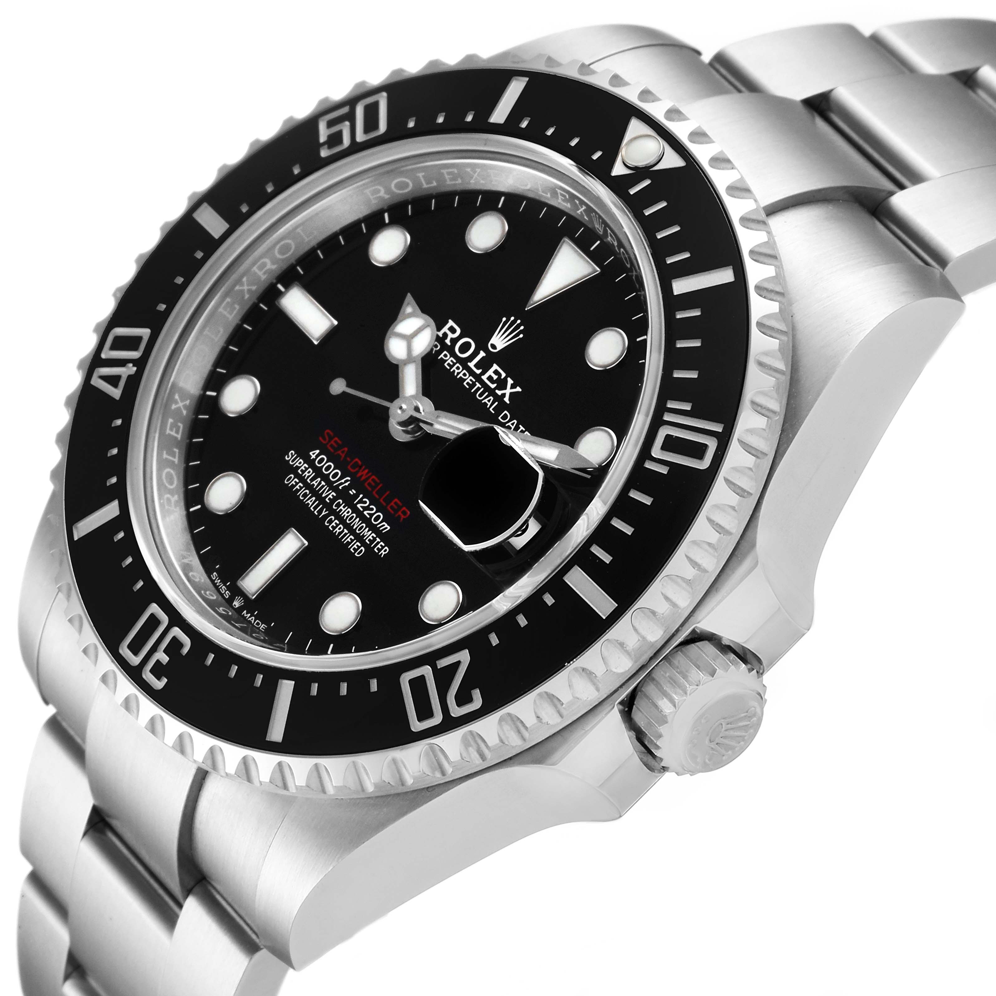 The image shows the Rolex Sea-Dweller 126600 Men
s Stainless Steel Black Dial 126600 Men
s Stainless Steel Black Dial watch at a slight angle, highlighting its bezel, dial, and part of the bracelet.