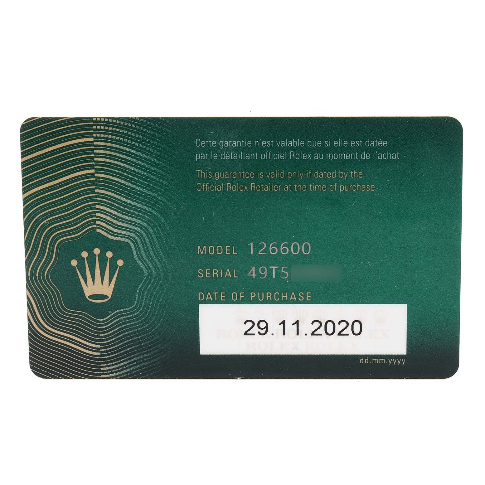 This image shows the warranty card for the Rolex Sea-Dweller 126600 Men
s Stainless Steel Black Dial 126600 Men
s Stainless Steel Black Dial model 126600, including details like serial number and purchase date.