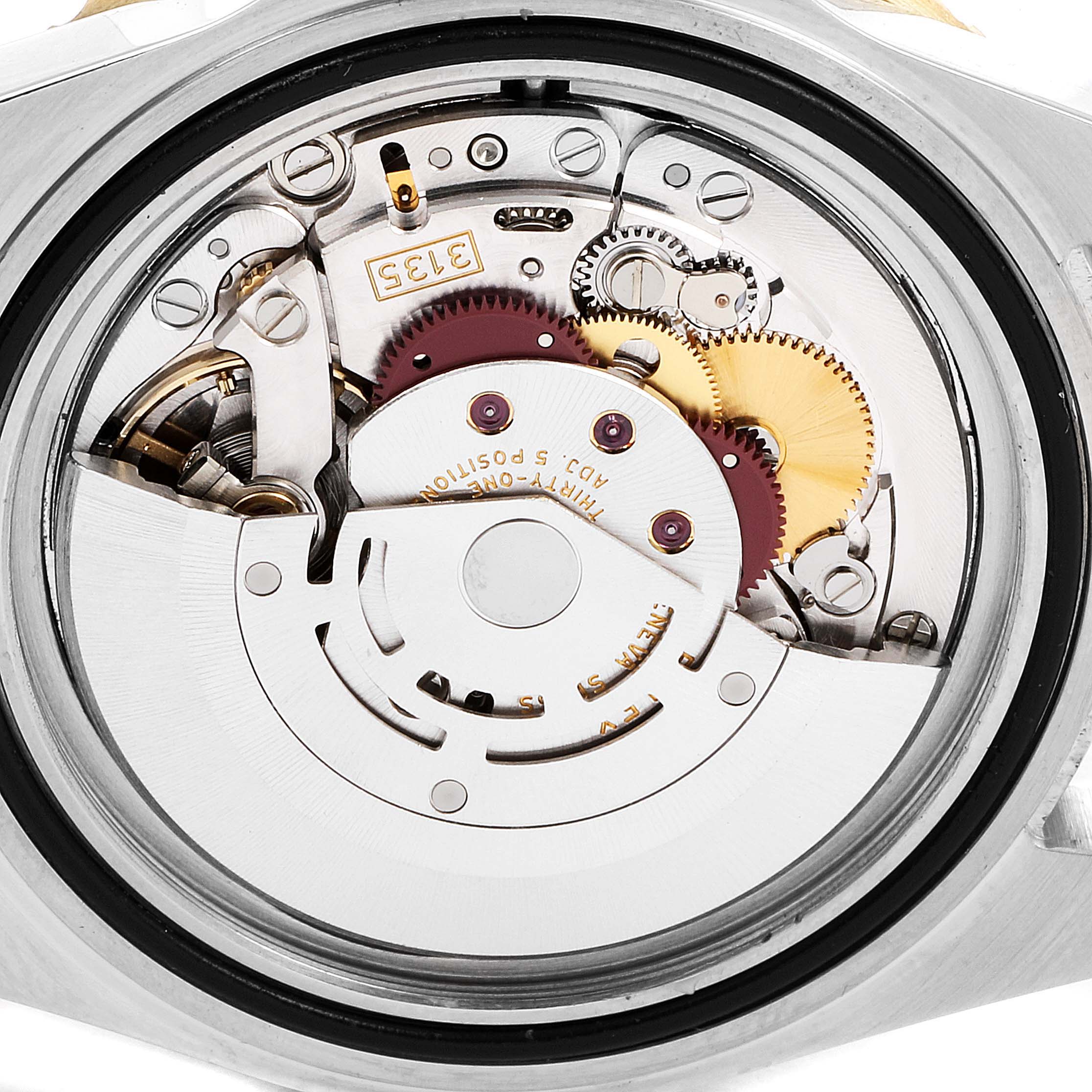 This image shows the movement mechanism of a Rolex Submariner 16613 Men's Steel and Gold (two tone) Black Dial 16613 Men's Steel and Gold (two tone) Black Dial watch from a rear angle.