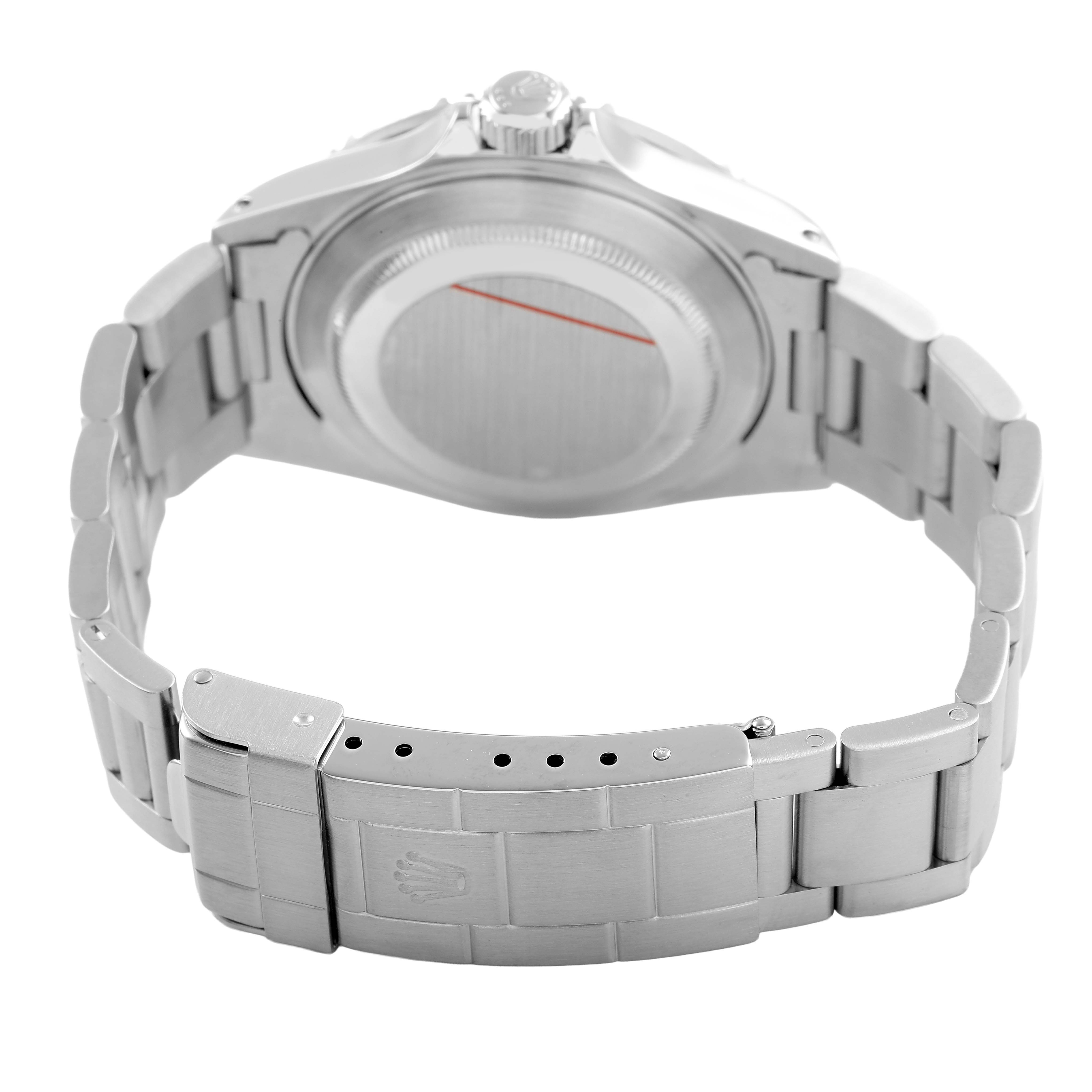 The image shows the back and clasp of a Rolex Submariner 16610 Men's Stainless Steel Black Dial, highlighting the bracelet and case back.