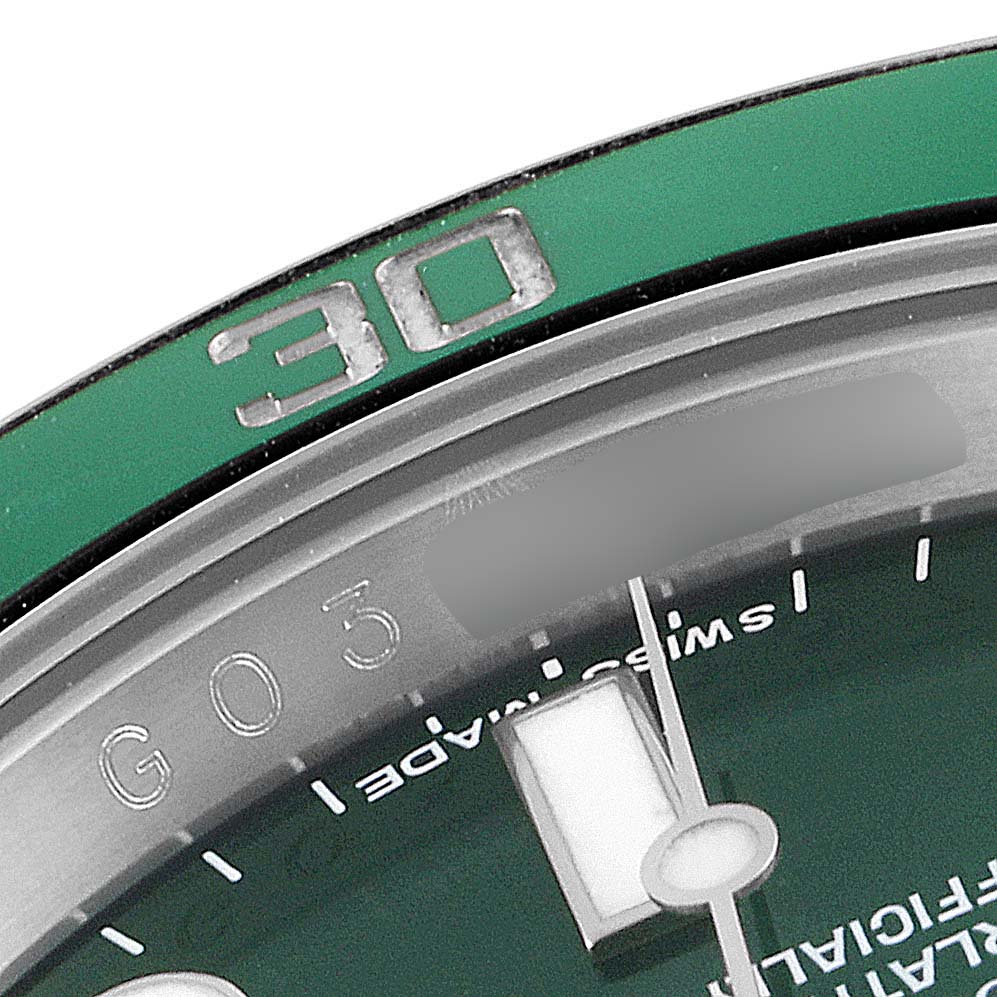The image shows a close-up of the bezel and dial of a Rolex Submariner 116610LV Men
s Stainless Steel Green Dial 116610LV Men
s Stainless Steel Green Dial watch at an angle highlighting the "30" marking.