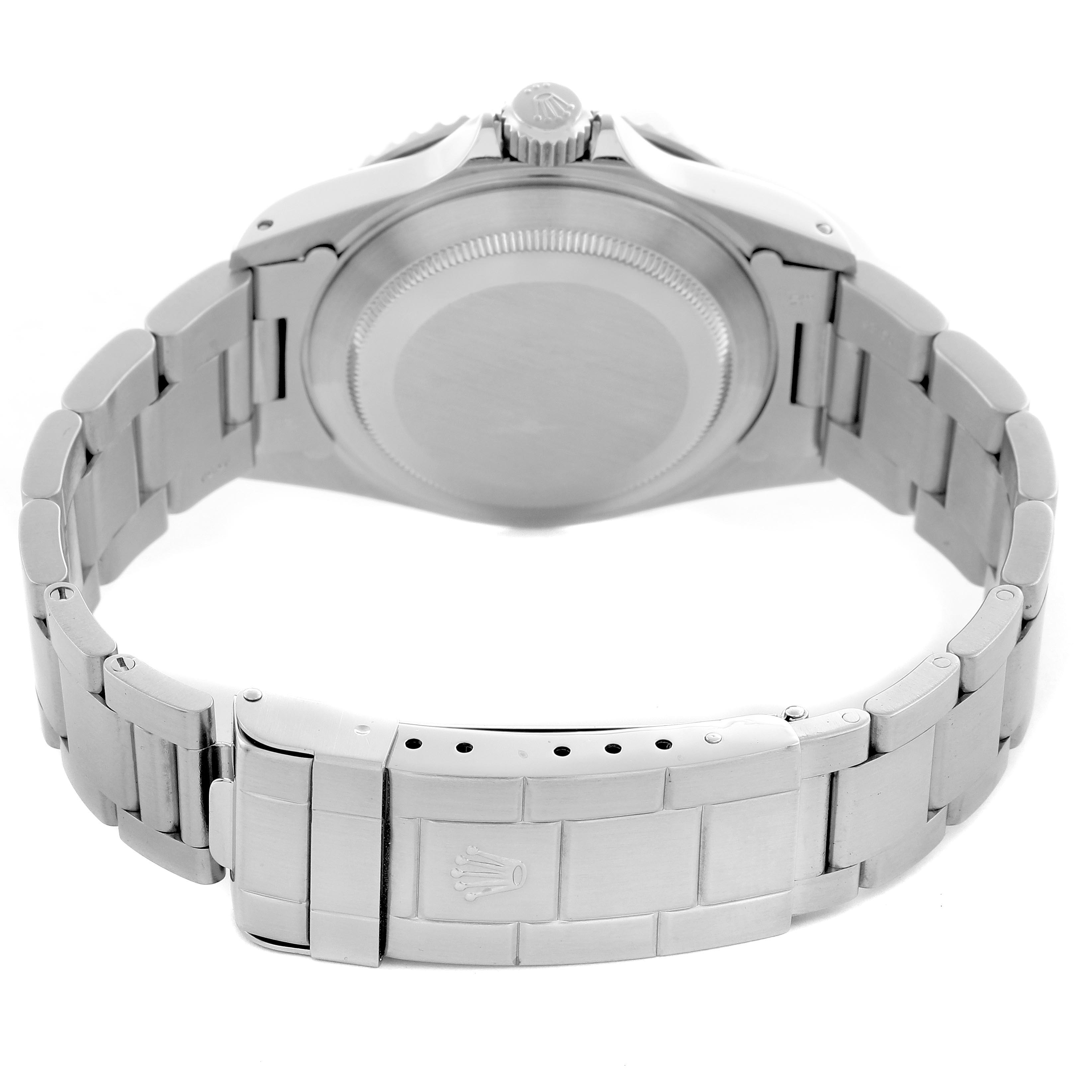 The image shows the back case and bracelet clasp of a Rolex Submariner 14060 Men's Stainless Steel Black Dial 14060 Men's Stainless Steel Black Dial watch from a rear angle.