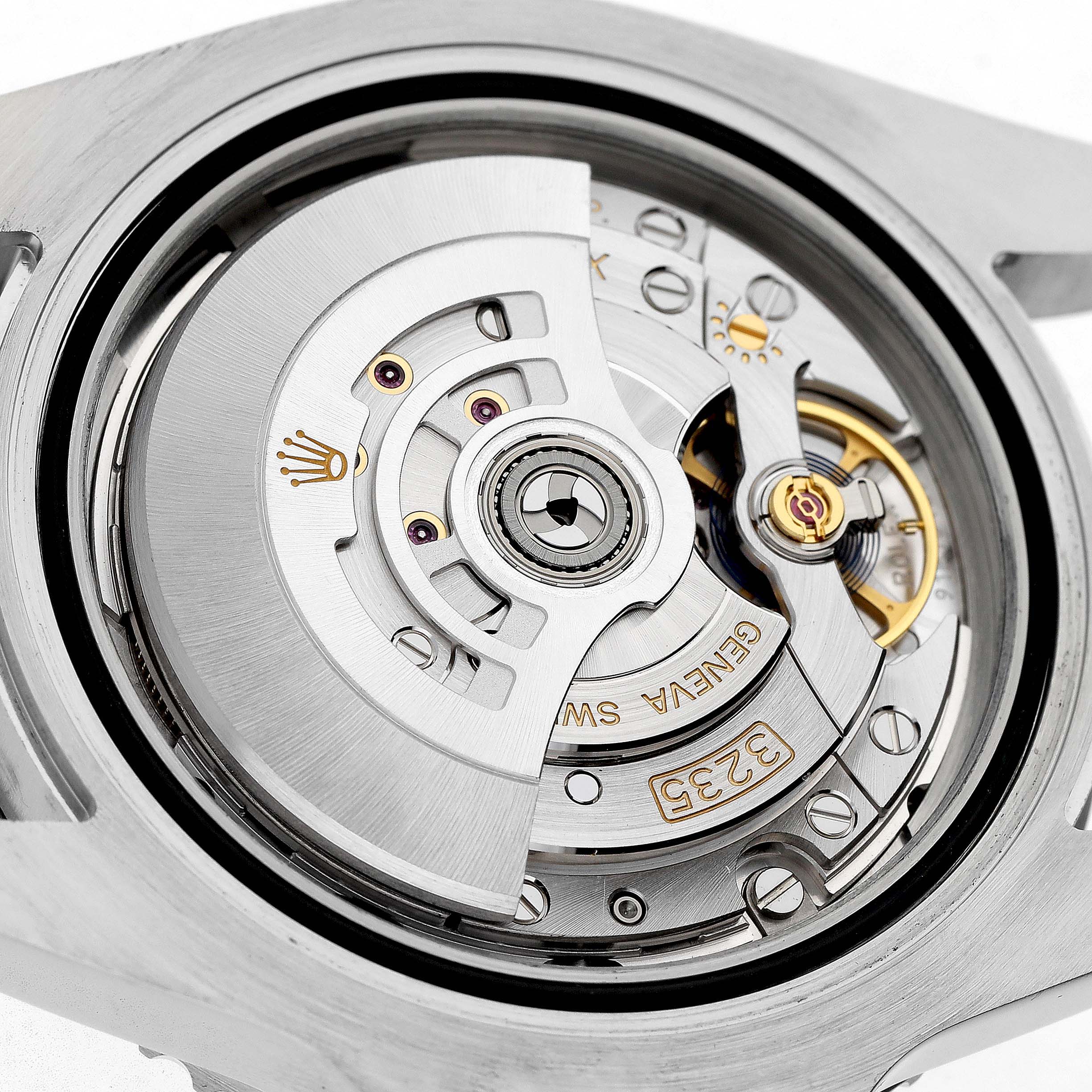 The image shows a close-up of the movement mechanism of a Rolex Submariner M126610LN Men's Stainless Steel Black Dial watch from a rear angle.