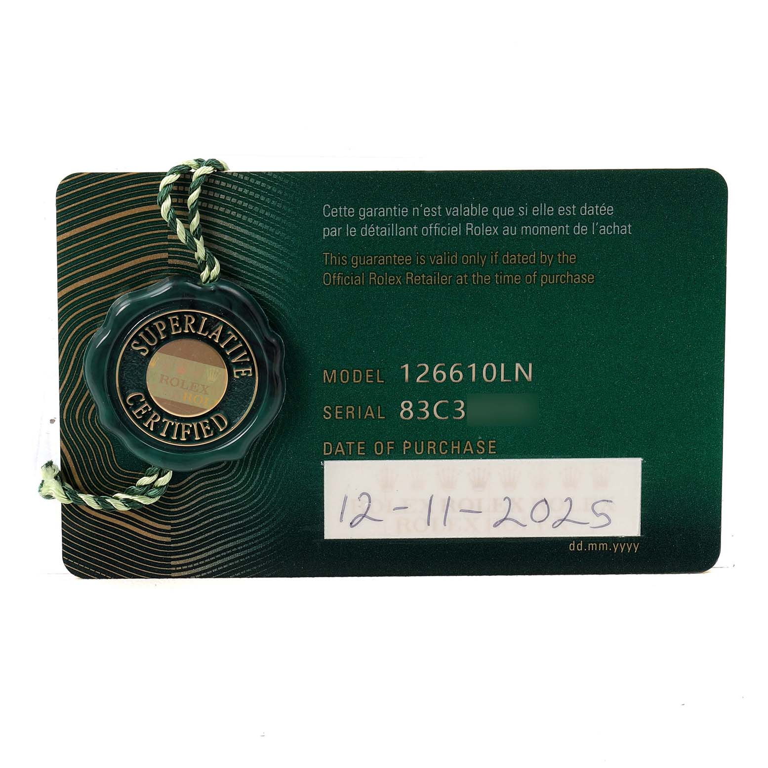 The image shows a Rolex Submariner M126610LN Men's Stainless Steel Black Dial model tag and warranty card, displaying the model number 126610LN and purchase date.