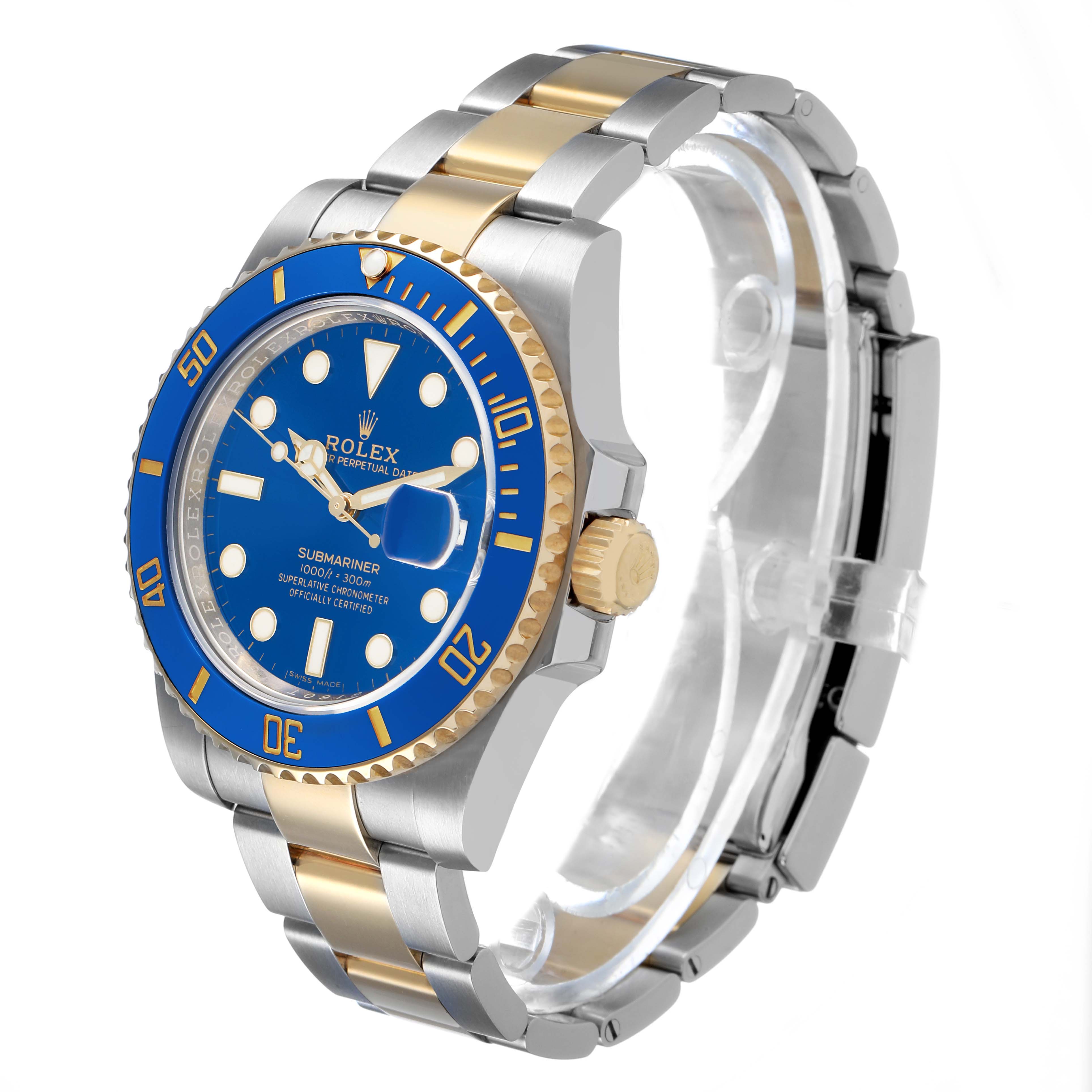 The Rolex Submariner 116613LB Men's Steel and Gold (two tone) Blue Dial watch is shown at a 3/4 angle, highlighting the bezel, dial, bracelet, and crown.