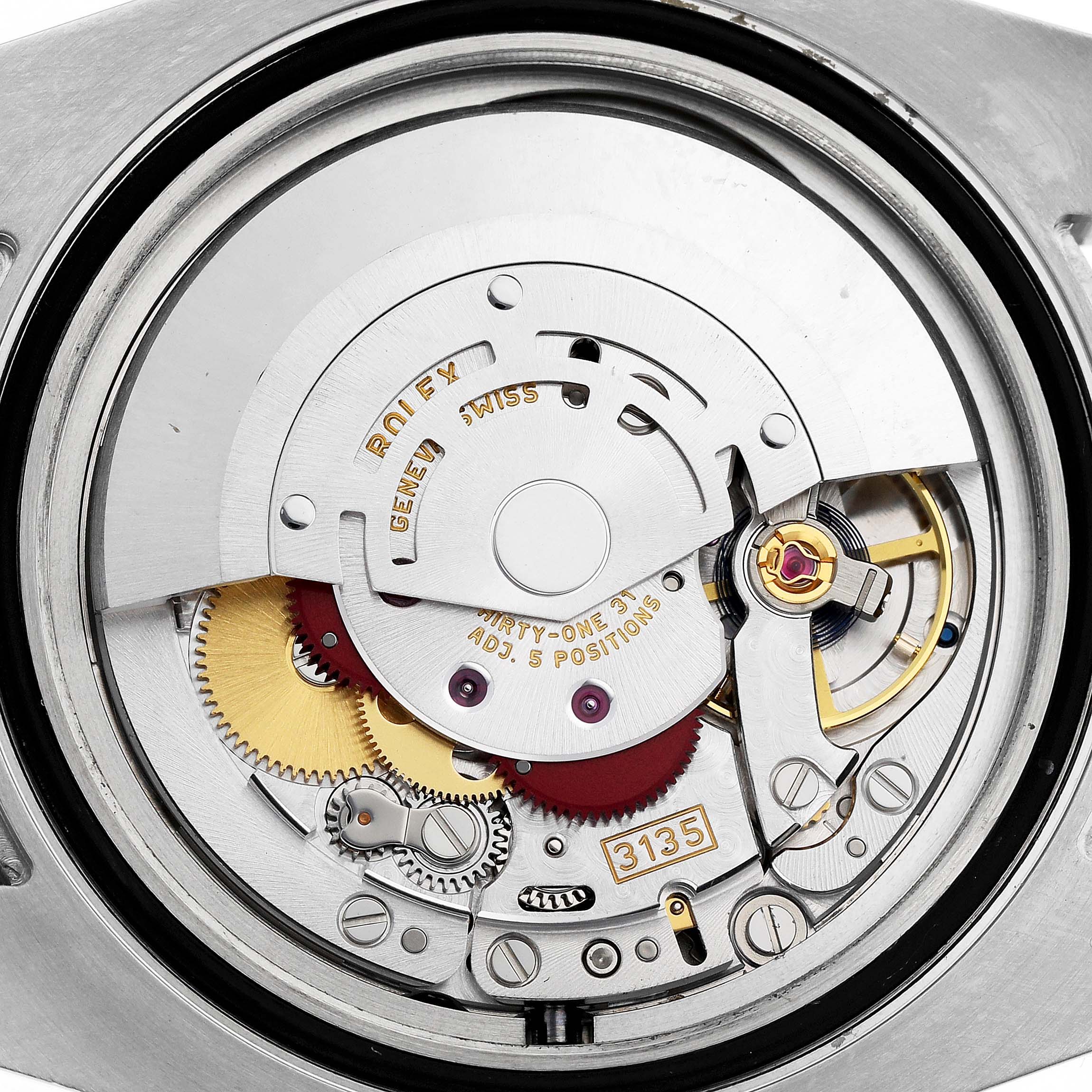 The image shows the internal mechanical movement of a Rolex Submariner 116613LB Men's Steel and Gold (two tone) Blue Dial watch, focusing on gears and components.